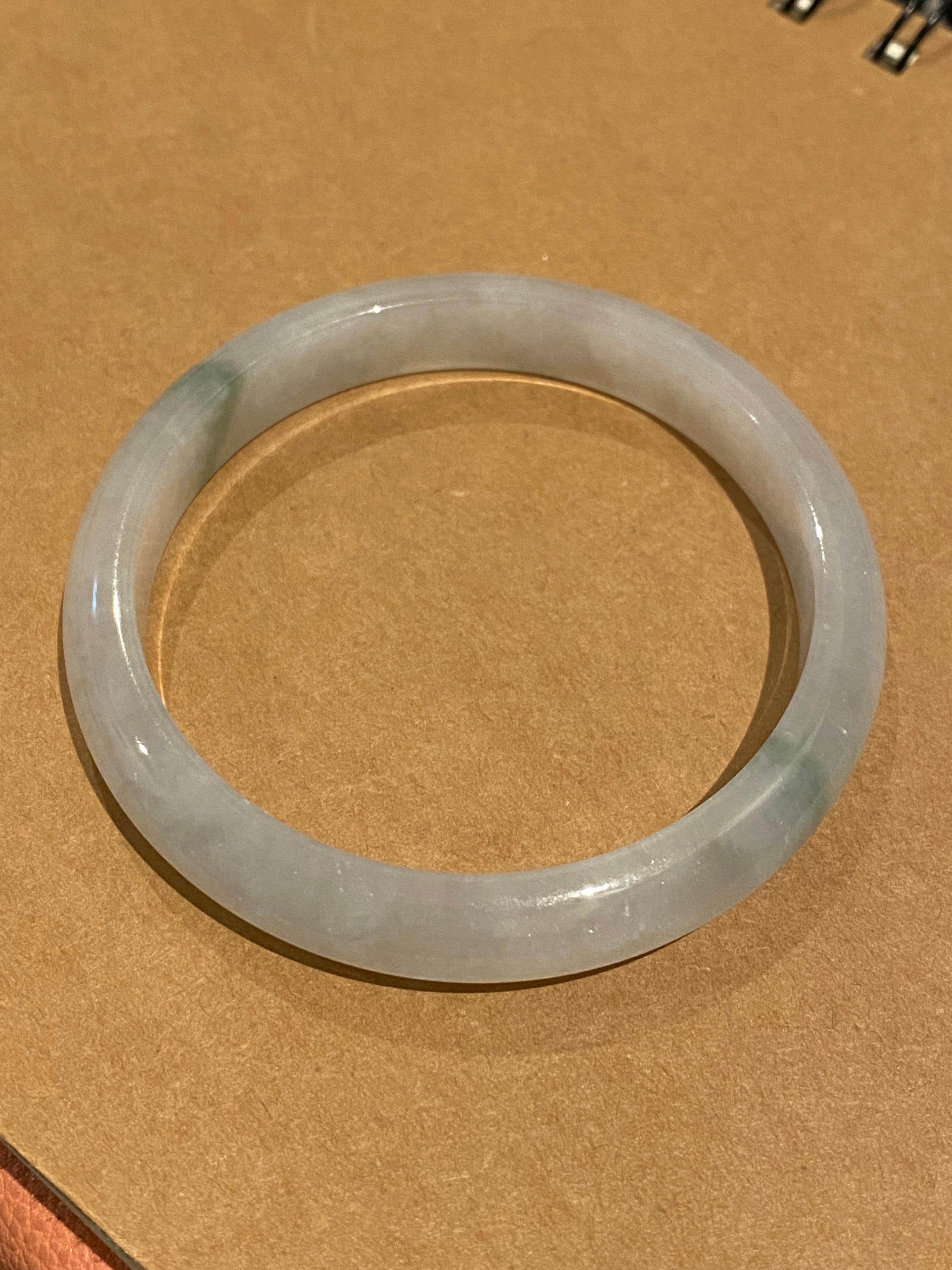 Type A Jadeite Bangle, of Greenish Grey colour, 37.1gr. 20cm, 58mm in diameter. In Excellent Condition For Sale In MELBOURNE, AU