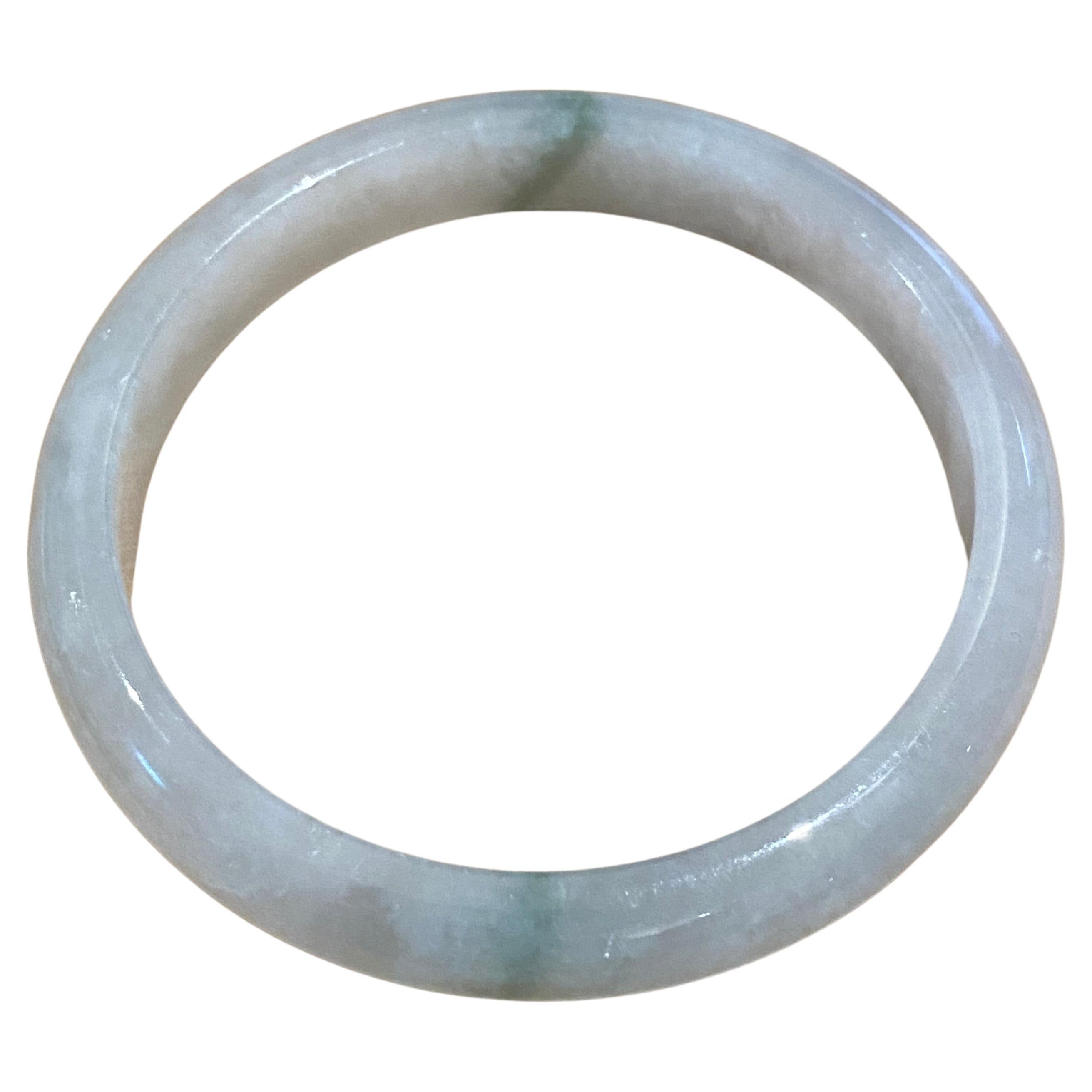Type A Jadeite Bangle, of Greenish Grey colour, 37.1gr. 20cm, 58mm in diameter. For Sale