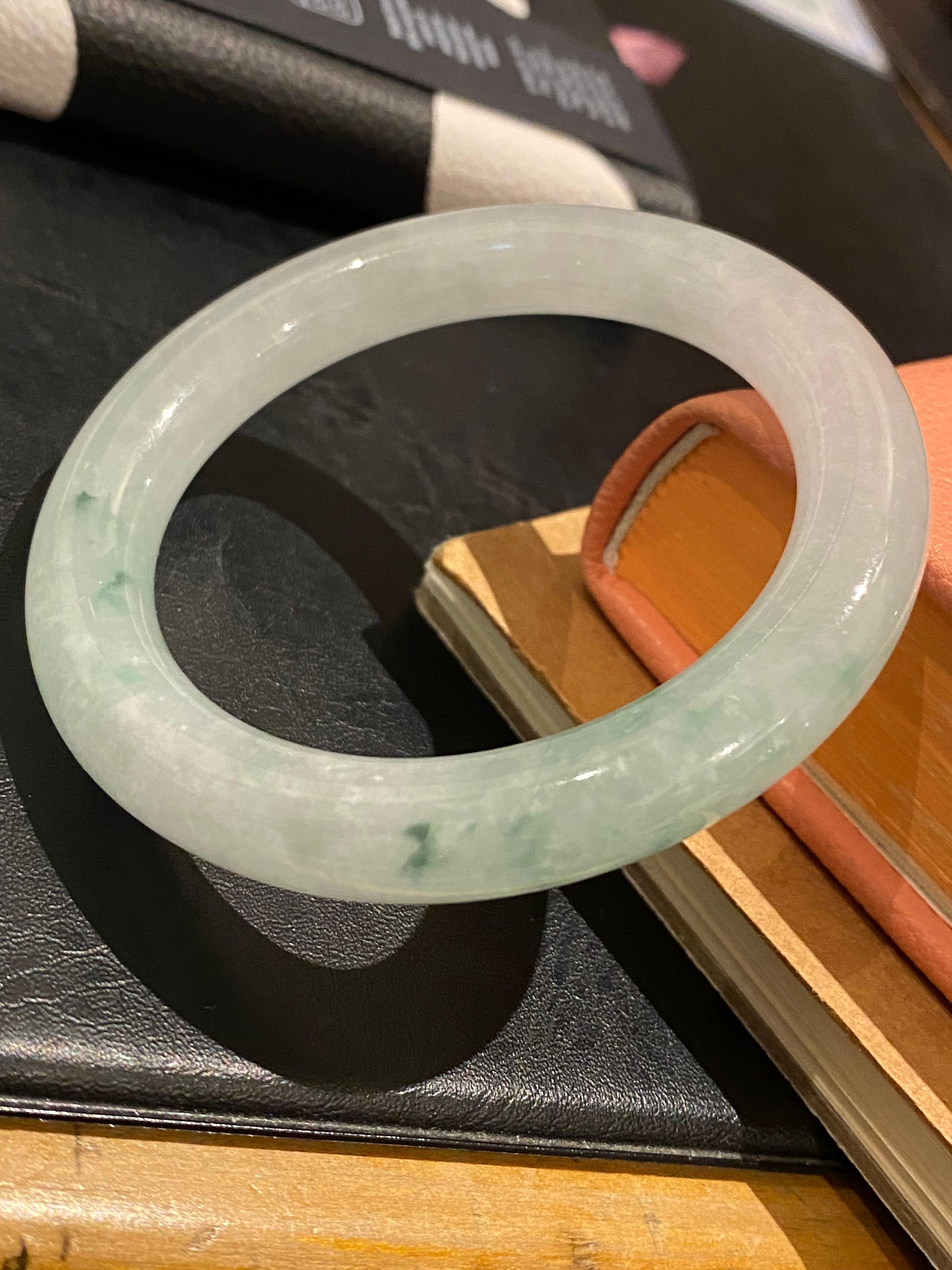 Type A Jadeite Bangle, of Greyish Green colour, 59.7gr. 21cm, 55mm in diameter. In Excellent Condition For Sale In MELBOURNE, AU