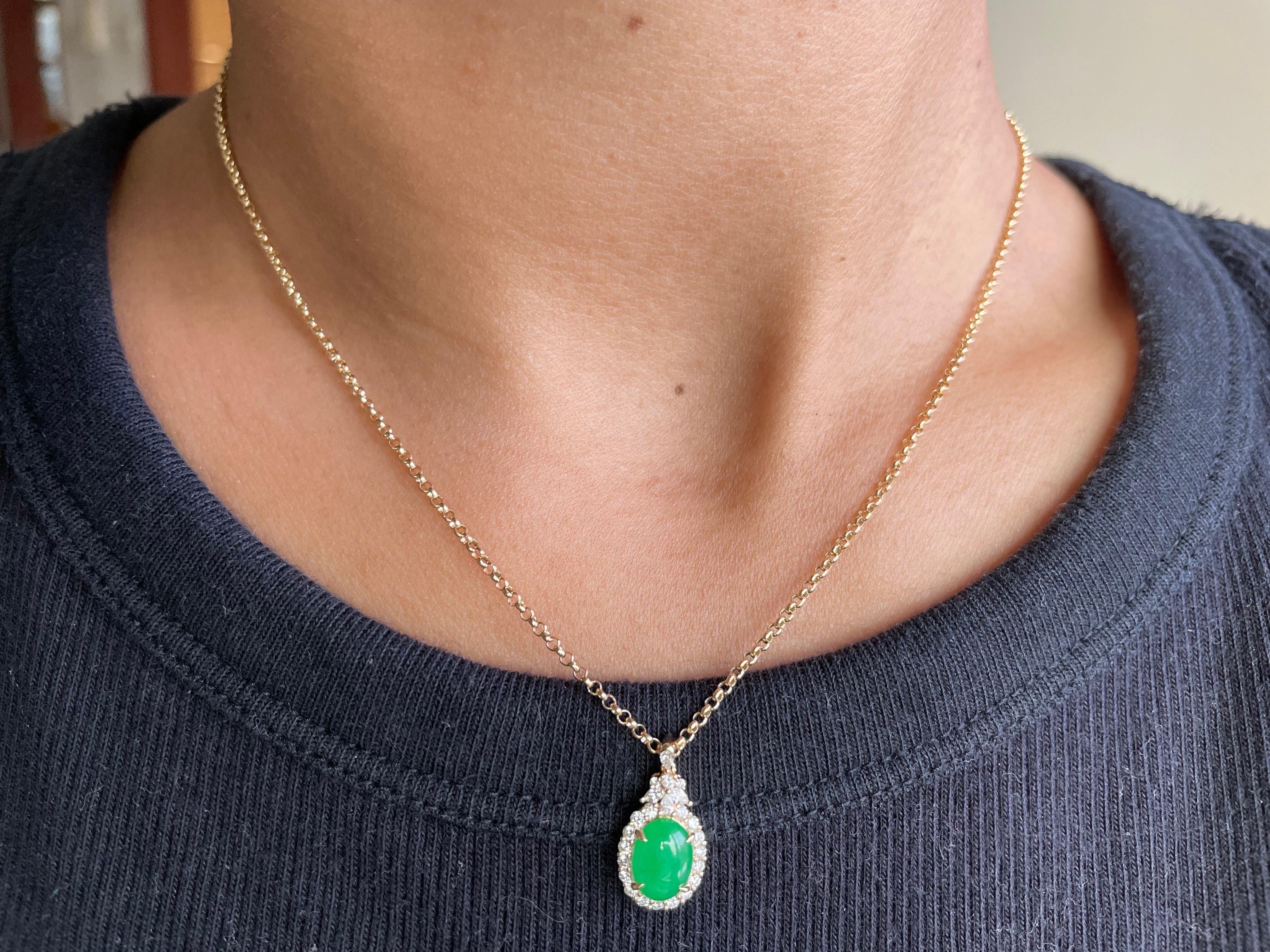 This pendant is crafted from 18k solid gold and adorned with a genuine Type A Jadeite Jade.

The pendant is set with a marquise and pear cut Natural Diamonds that sparkle and shine, adding an extra layer of luxury to the piece. It comes with a 18k