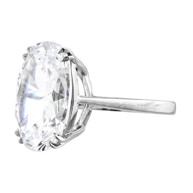Contemporary GIA Certified 6.09 Carat Oval Diamond Cut Ring D Color VS1 Clarity For Sale