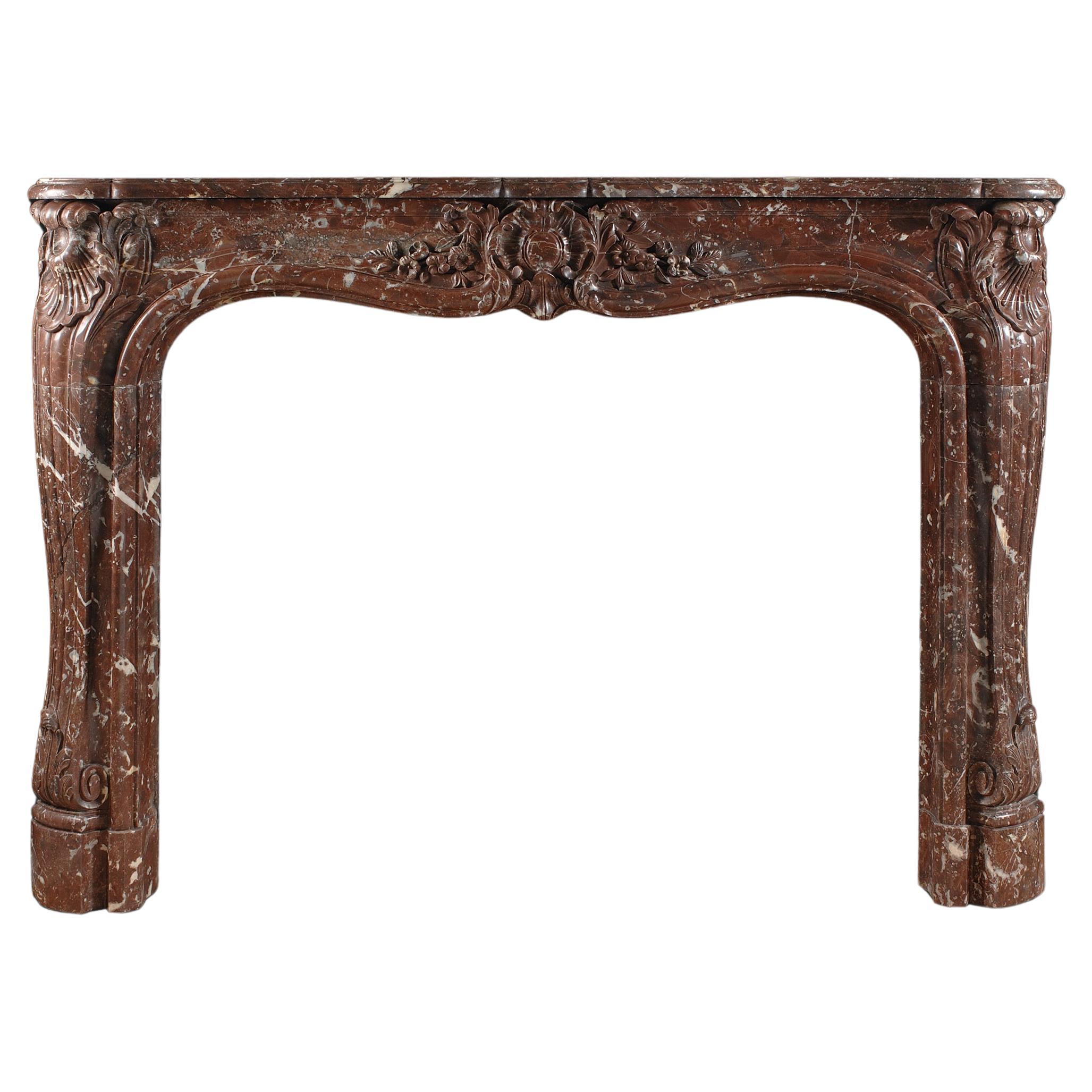Typical 18th century Louis XV style marble fireplace model made in a old Belgium For Sale