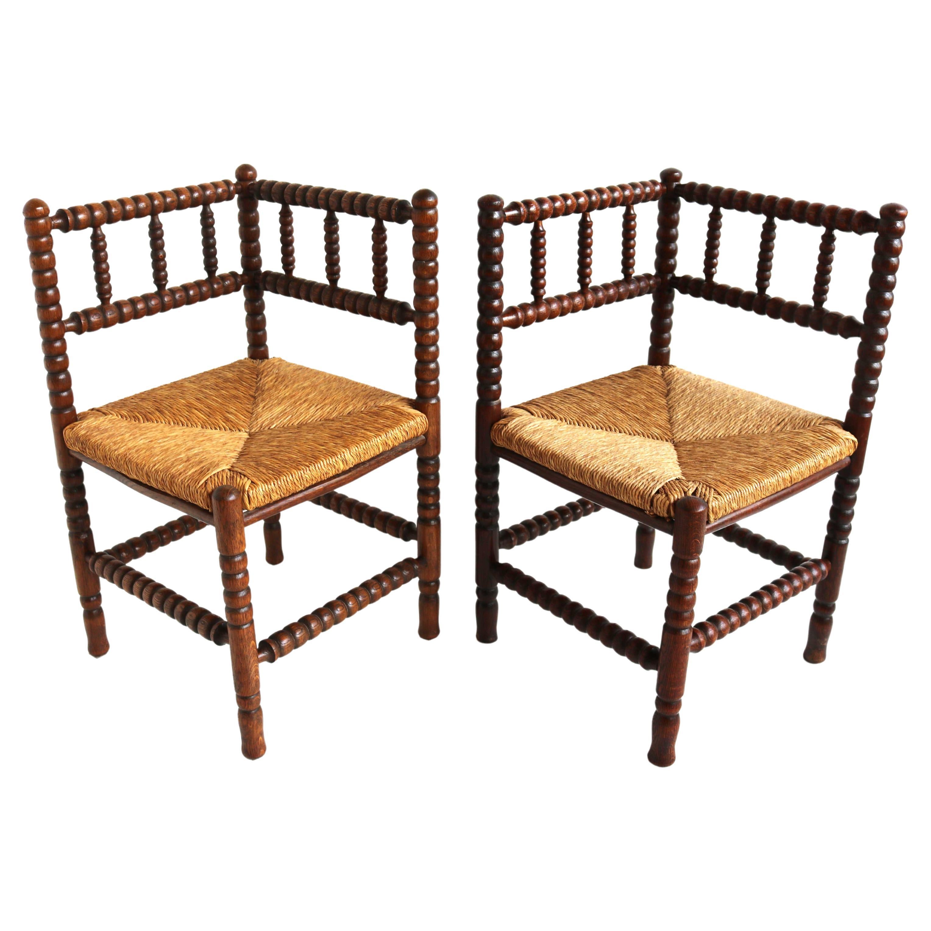 Pair Antique Rush-Seat Corner Bobbin Side Knitting Chairs in Turned Oak and Cane, Dutch ca 1900, Country Living, Farmhouse Decor.
Lovely couple typical Dutch knitting chairs, with minimal differences.
This antique 'corner chair' with wicker seat