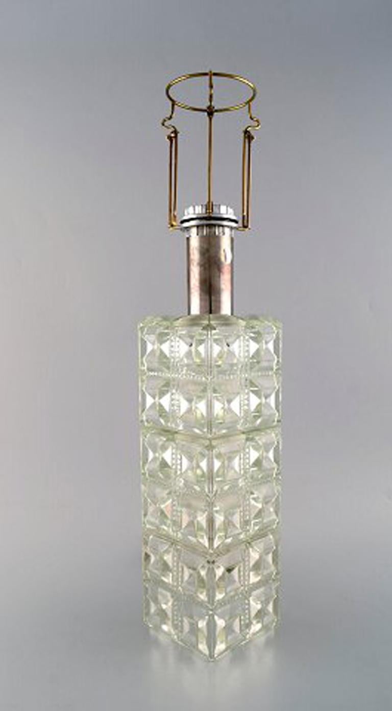 Swedish Tyringe for Orrefors. Modernist table lamp in mouth blown art glass.  1960s For Sale