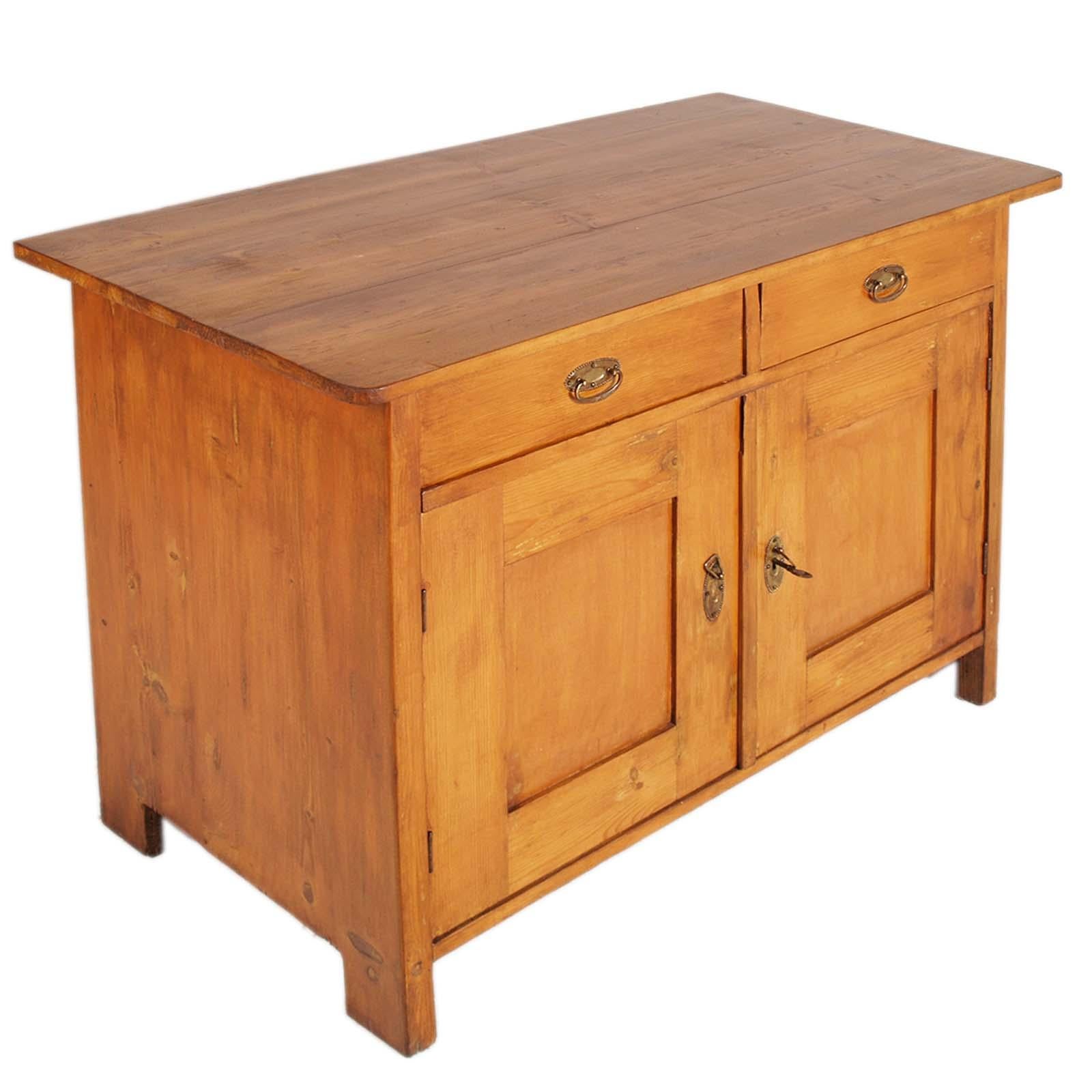 Exceptional charming antique Tyrolean handmade sideboard , in precious chestnut wood with gilded brass closing handles. The beauty and patina of this sideboard make it a precious piece of furniture in any environment. Wax polished.