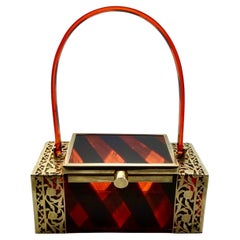 Vintage Tyrolean New York Gold Tone Filigree Black and Orange Striped Lucite Handbag 