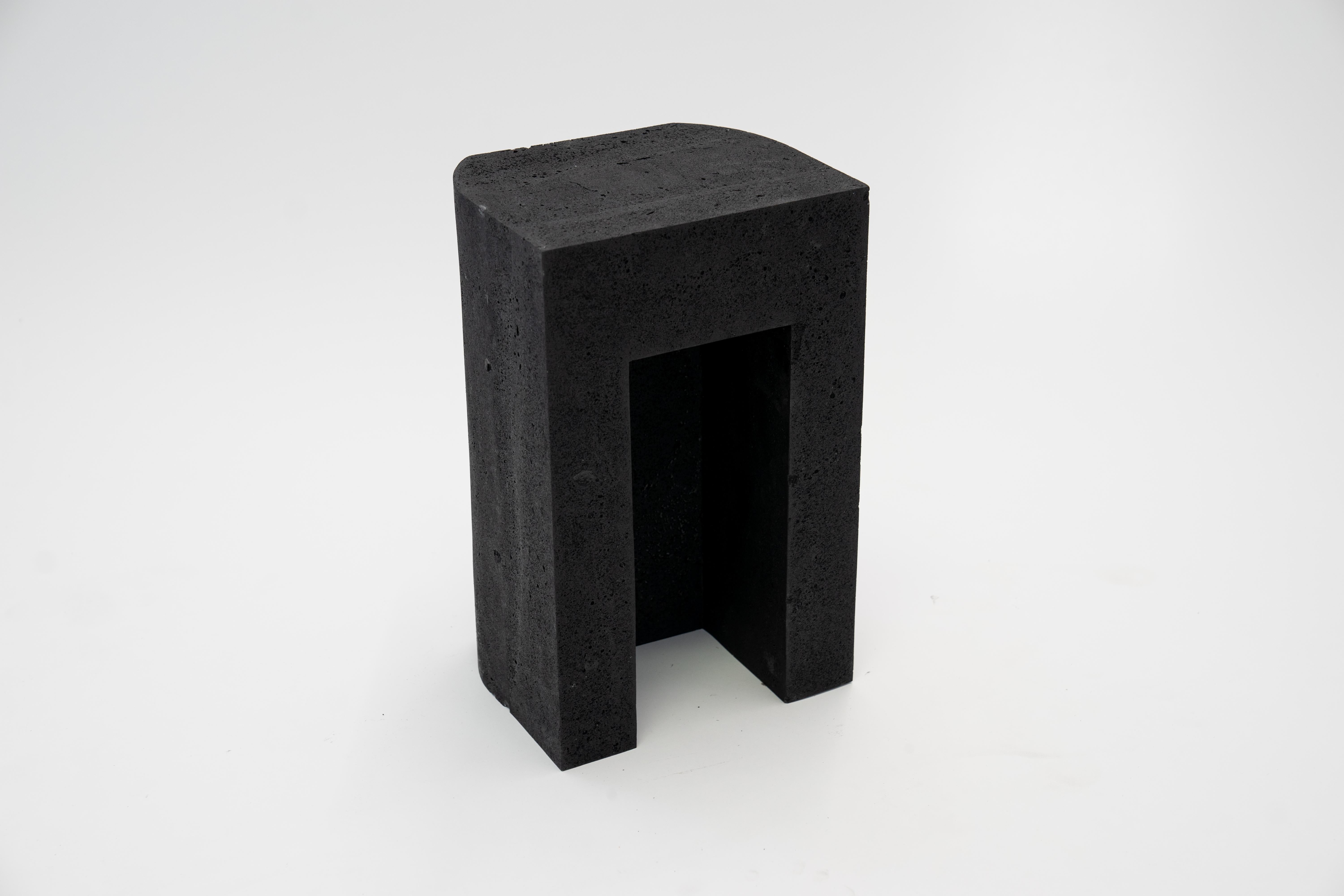 U-Block signed by Cal Summers
Materials: Wood fibre, Resin. Graphite
Steel insert with bronze finish
Size: 10” D x 14” W 19” H

Cal Summers is a British designer who makes bespoke handmade furniture and contemporary artefacts in which he