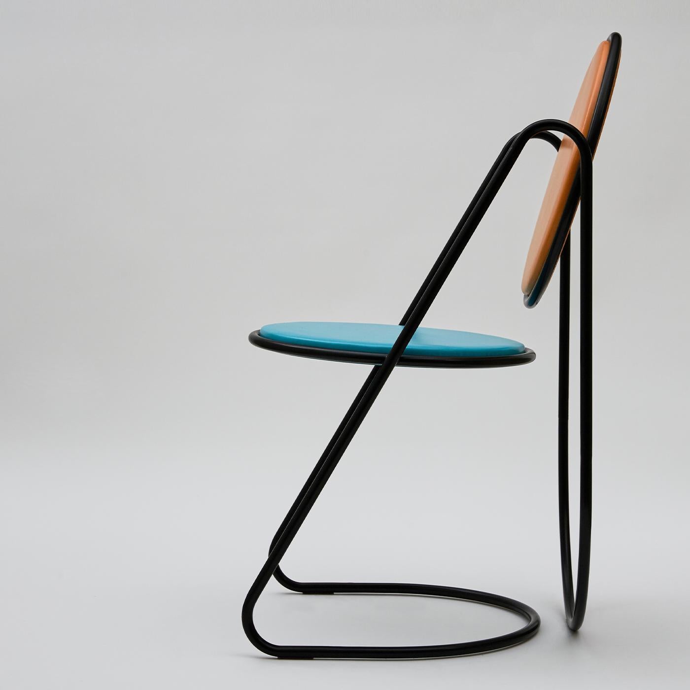 Dramatic and sculptural, this chair from the U-Disk Collection is sure to capture attention wherever it is placed. A natural addition to a retro-inspired decor, it consists of a continuous, cleverly bent tubular structure in black-lacquered steel