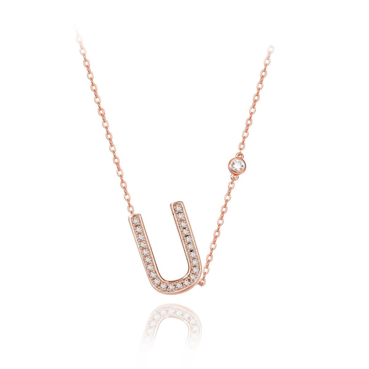 Nothing says YOU more than YOU. You are unique. You are bold. You're not afraid to share who you are. This initial bezel chain necklace is elegantly slimline while sharing a little bit about yourself with others. .925 sterling silver base also