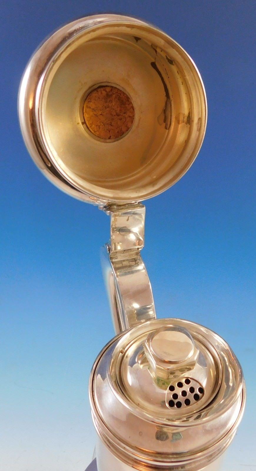 U. Vitali
Sterling silver martini Shaker handmade by Ubaldo Vitali. This martini pitcher measures 11 tall x 6 1/2 diameter. This piece was a presentation for The Meadowlands World Cup horse race on June 14, 1984. It is in excellent condition. Truly