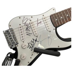 U2 Signierte Gitarre mit Fotoprobe