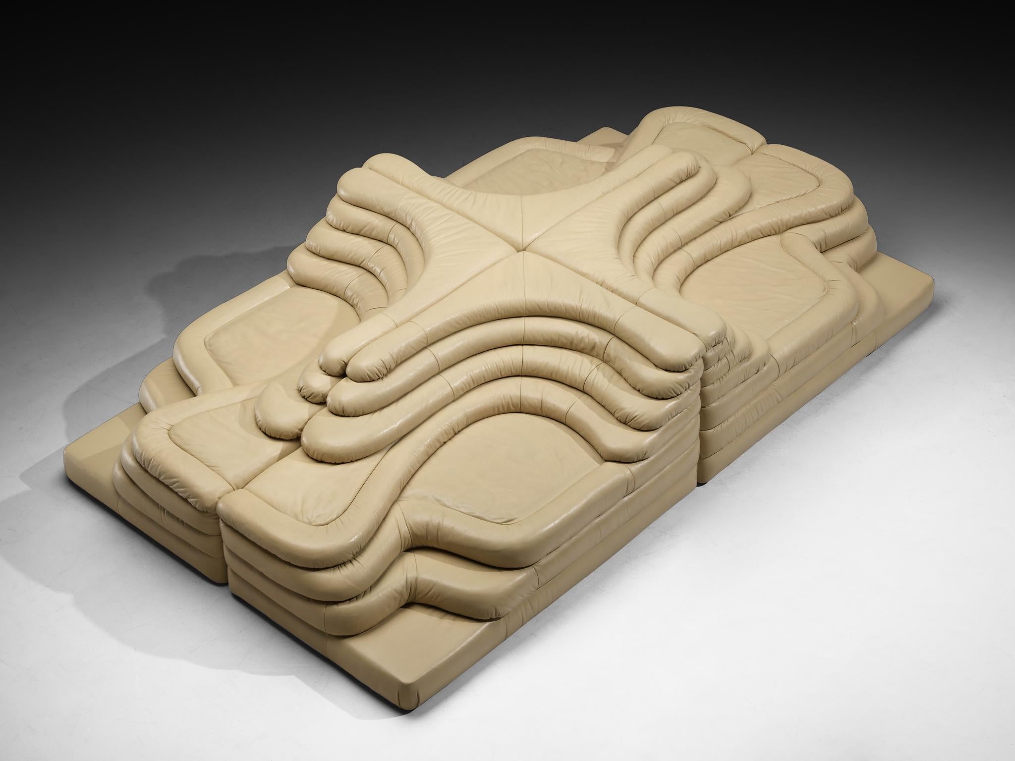 Ubald Klug for De Sede, DS-1025 'Terrazza' landscape sofa elements, leather, Switzerland, 1970s. 

Waterfall shaped sofas in leather by the Swiss manufacturer De Sede. The design for this sofa was inspired by mountains and especially the Alps. This