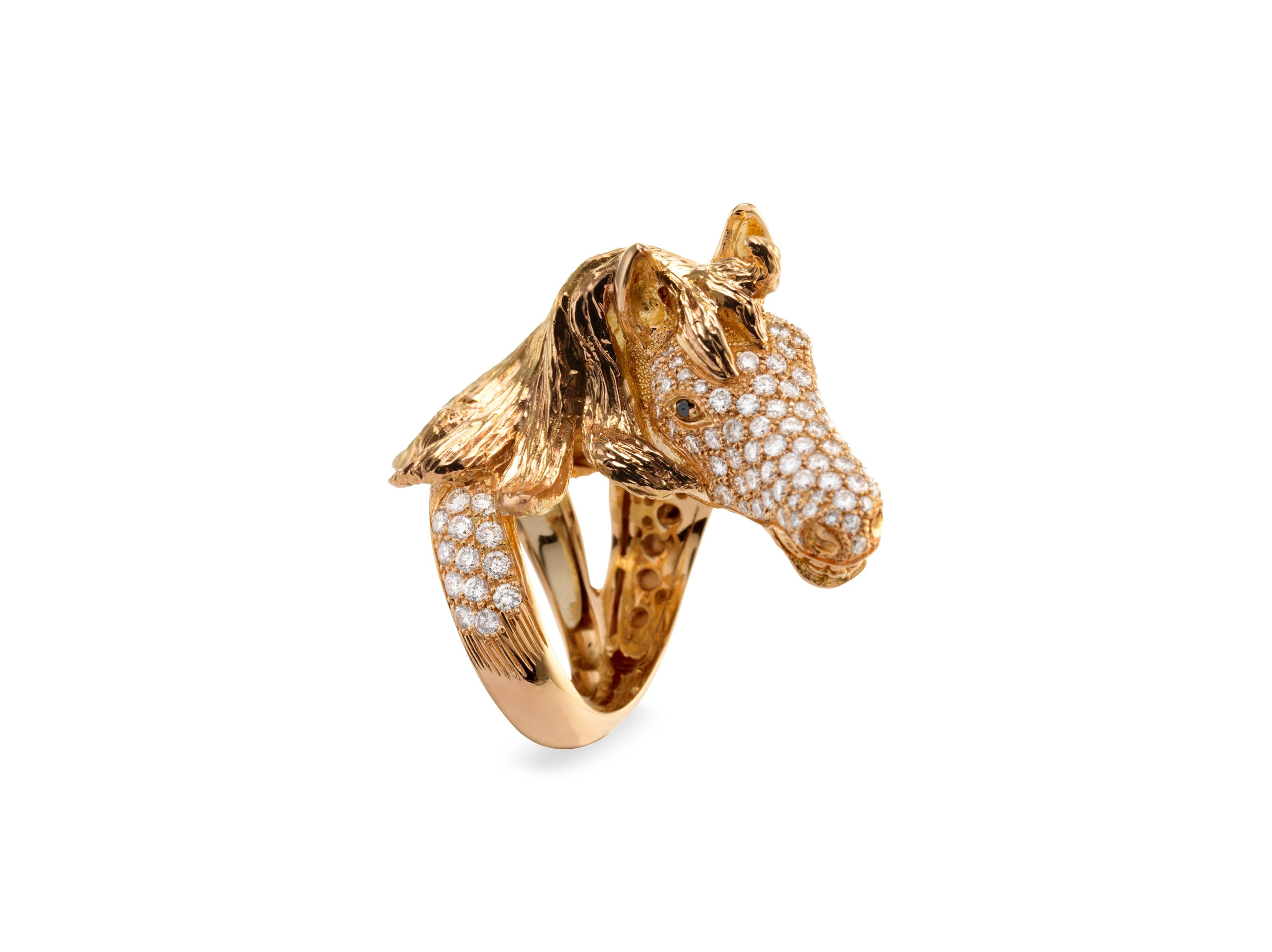 here we propose an Handmade in Italy,  Ubaldi Gioielli,  horse head sculpture ring, 

Handcrafted in rose gold 18k.
Pavè of diamond, G color and purity VVs, for a total carat weight of 2.20 Ct.
Diamonds nestled on the entire surface of the annular