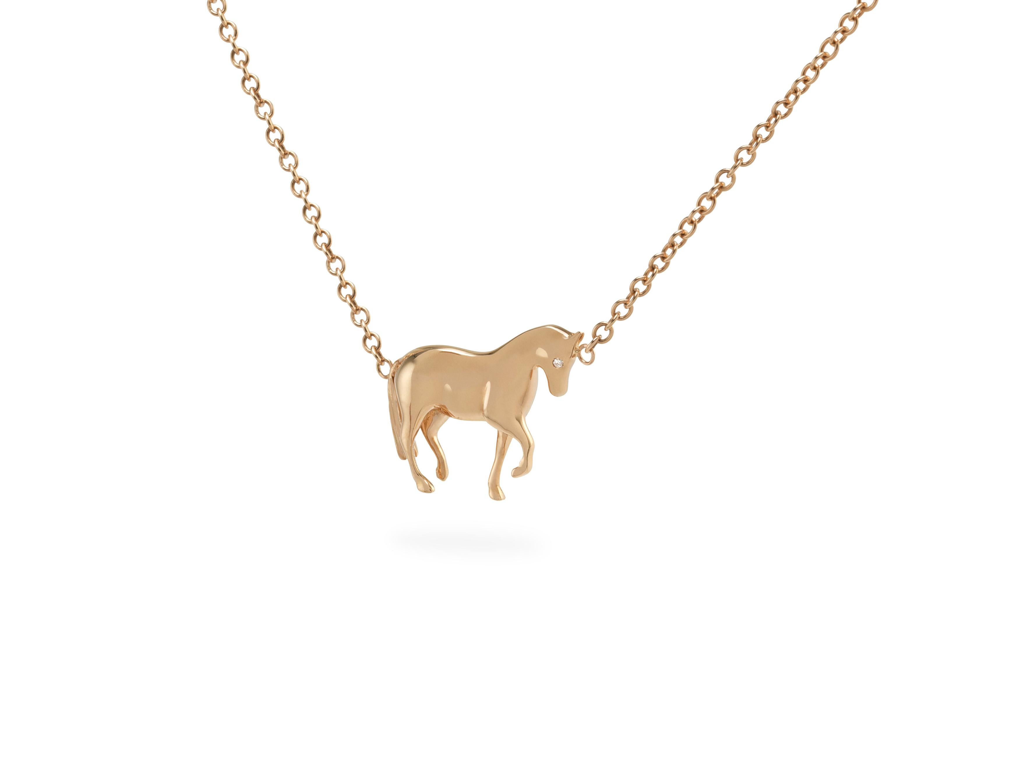 here we propose an Handmade in Italy,  Ubaldi Gioielli

Handcrafted “Horse” pendant in rose gold 18k  
Rolo chain in rose gold 18k  
Diamond G color and VVs clarity, for a carat weight of 0.01 Ct.
Adaptable length, Horse-Bit clasp detail !
 
All