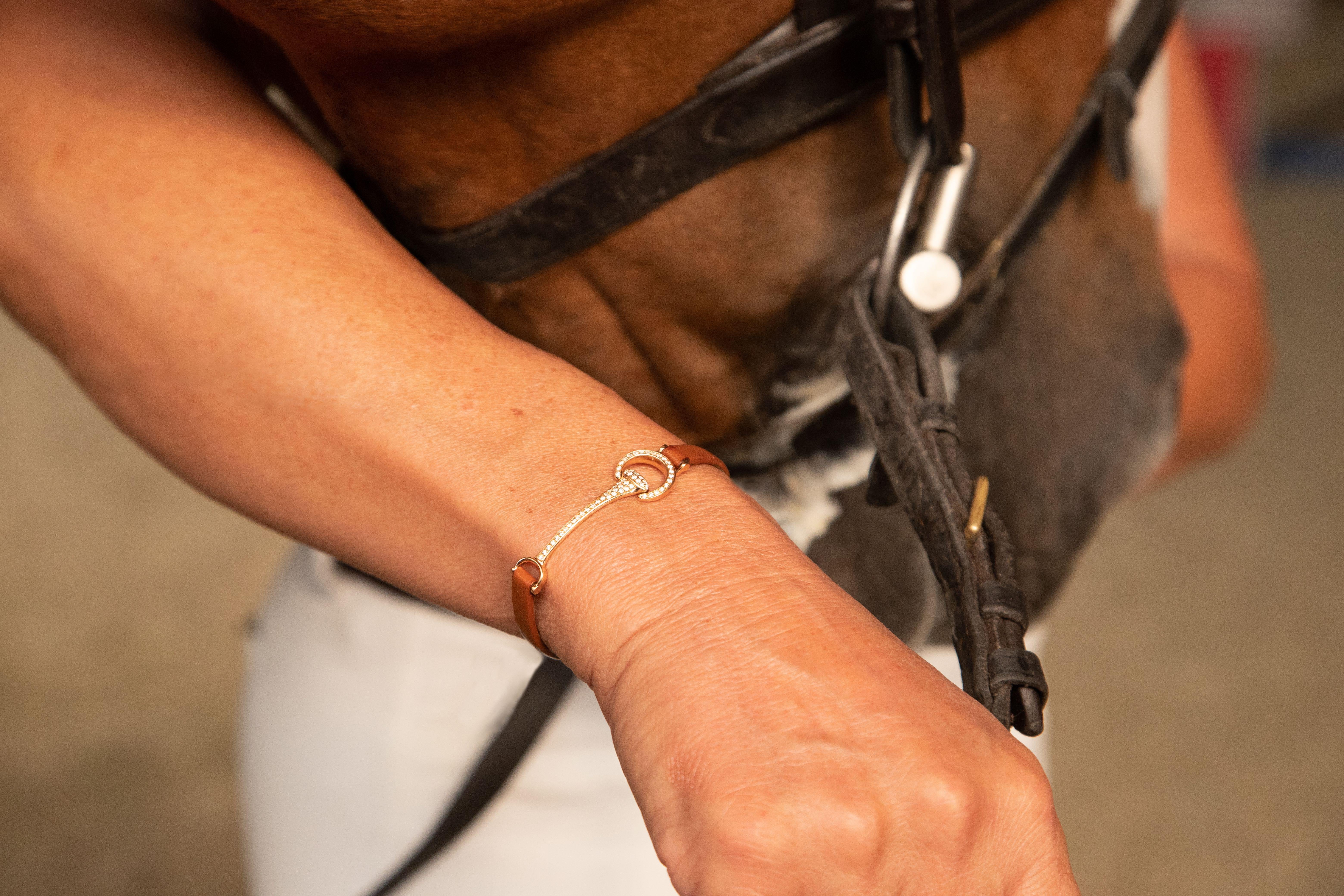 Handcrafted “Horse bit” bracelet in rose gold 18k, with custom brown calfskin leather strap.
18kt rose  gold buckle.

The HorseBit, symbol of elegance and belonging to the equestrian world.
The horseshoe and the horsebit, equestrian symbols, brings