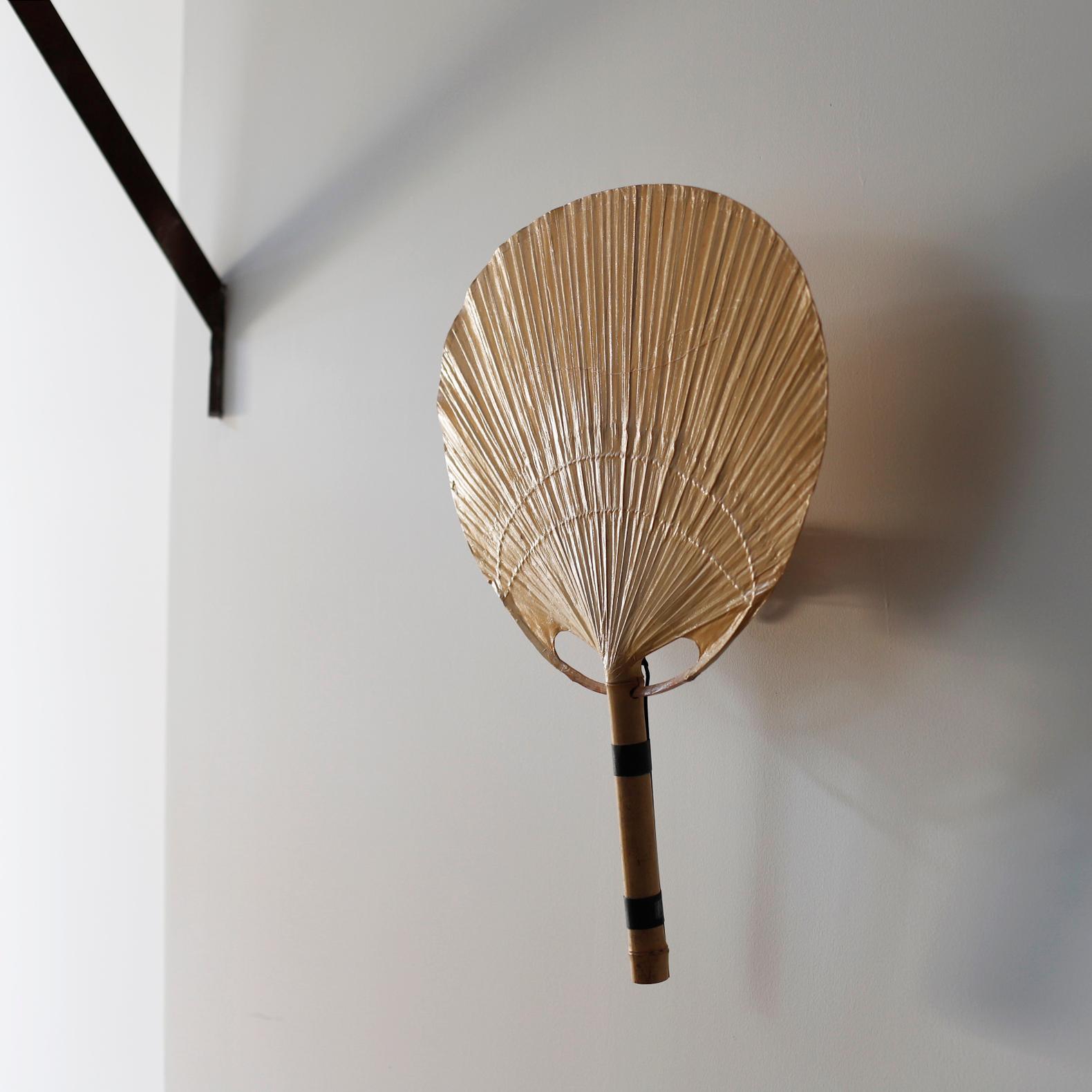 The Uchiwa lamp was designed by Ingo Maurer, in Germany, 1973. From the start, Maurer's interest in paper for lampshades was linked with his interest in Japan.
  