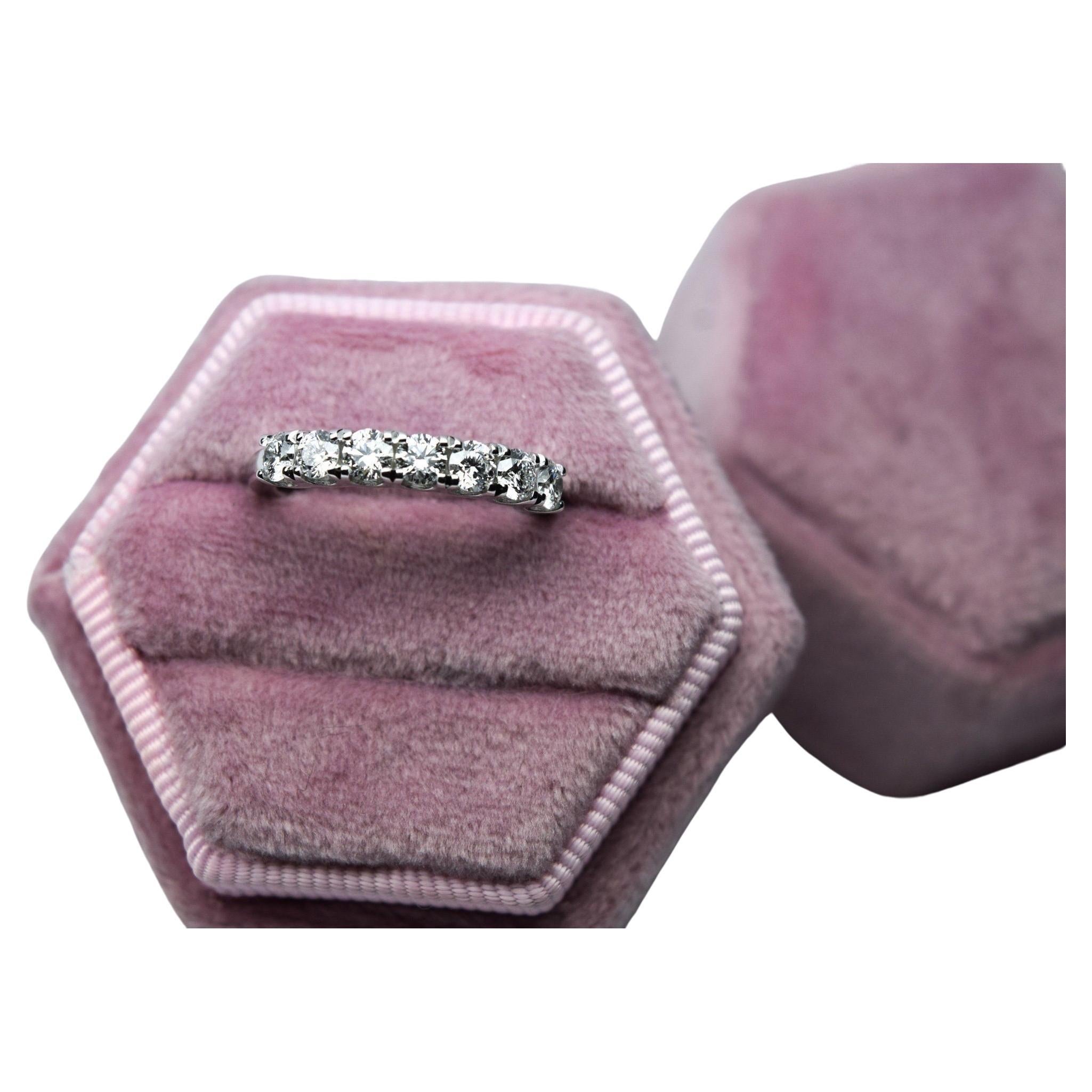 Stunning Ucut diamond ring, half eternity, diamonds VS clarity, F color, EX cut. Ring is size 7 and can be re-sized free of charge. Diamonds are 1.20 carats in total.
*Item will come with a beautiful packaging and certificate of authenticity from