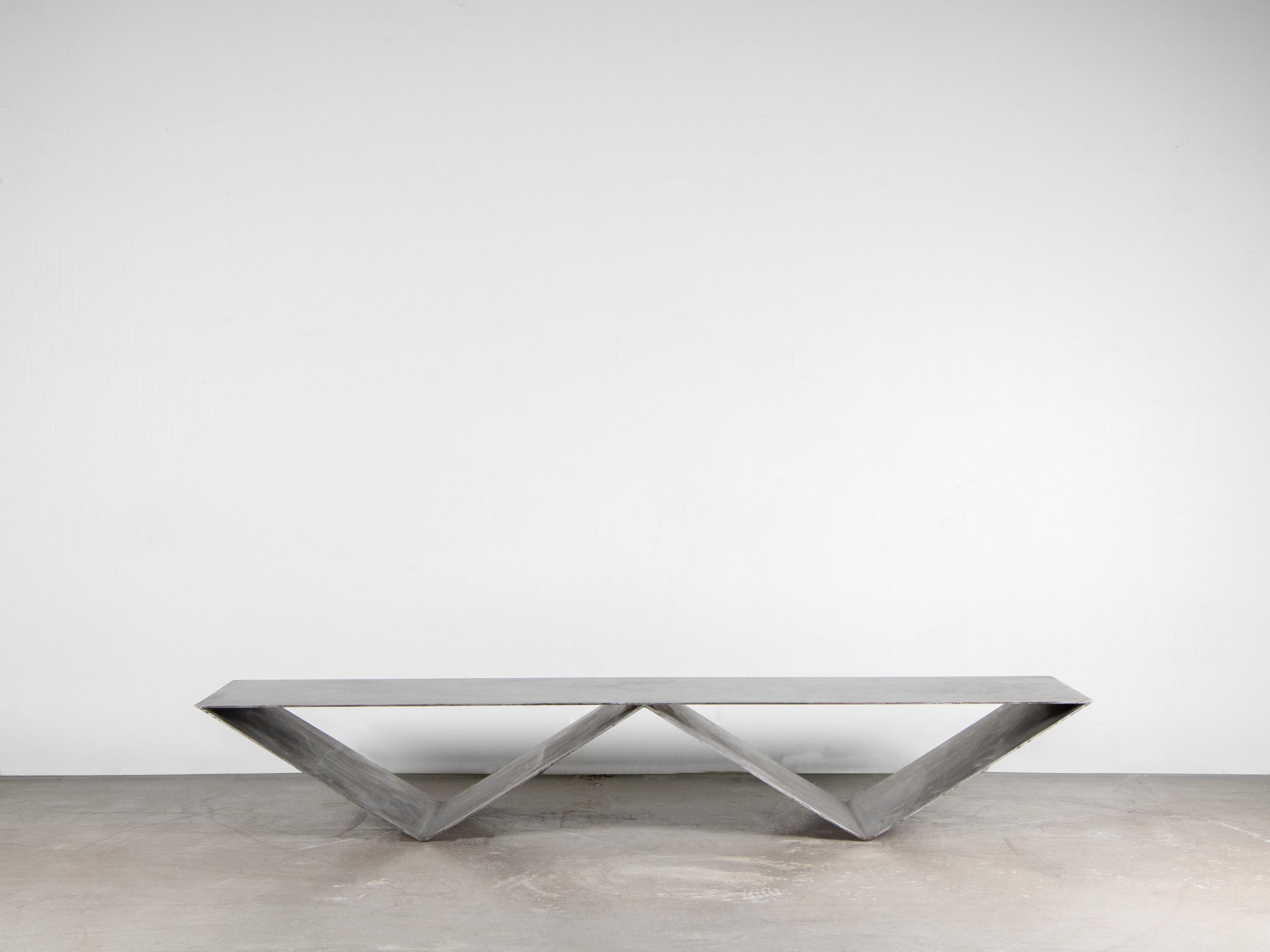UDD sofa table by Lucas Tyra Morten
2019
Limited edition of 27
Dimensions: L 170, W 45, H 27 cm
Material: anodize the aluminum by hand which enabled the more organic faint pattern.

During a visit to the Jewish museum in New York City, Lucas Morten
