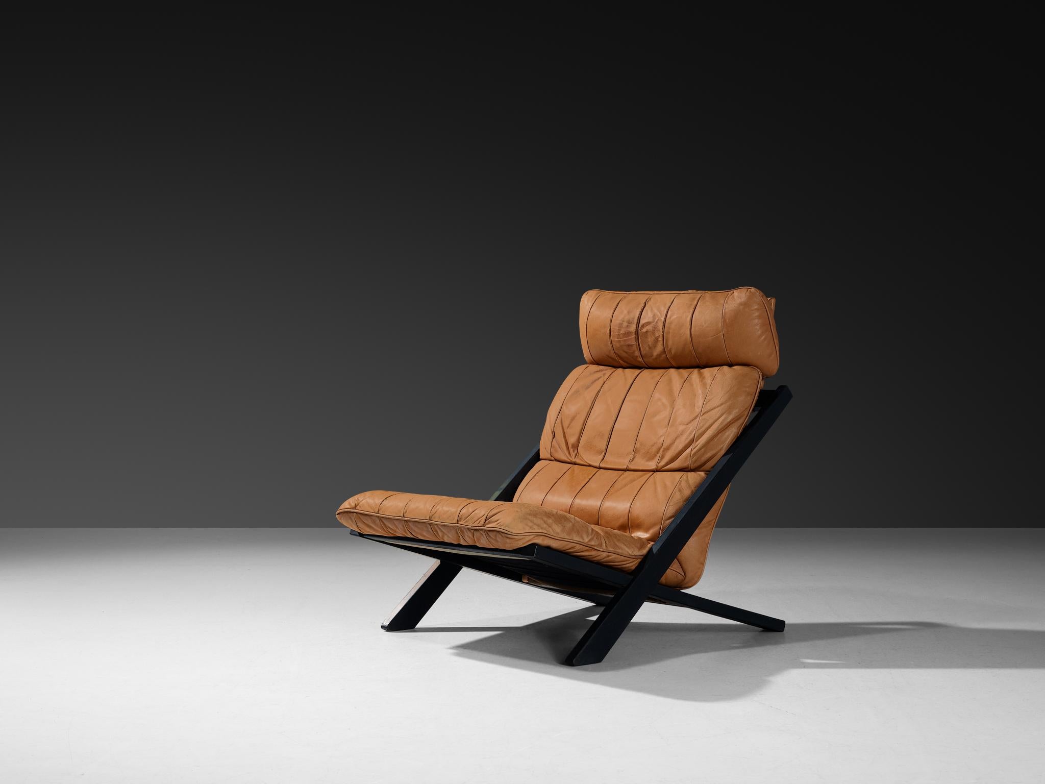 Ueli Berger für De Sede, Loungesessel, Modell 'DS-80', lackiertes Holz, Leder, Schweiz, 1970er Jahre

Der Loungesessel 