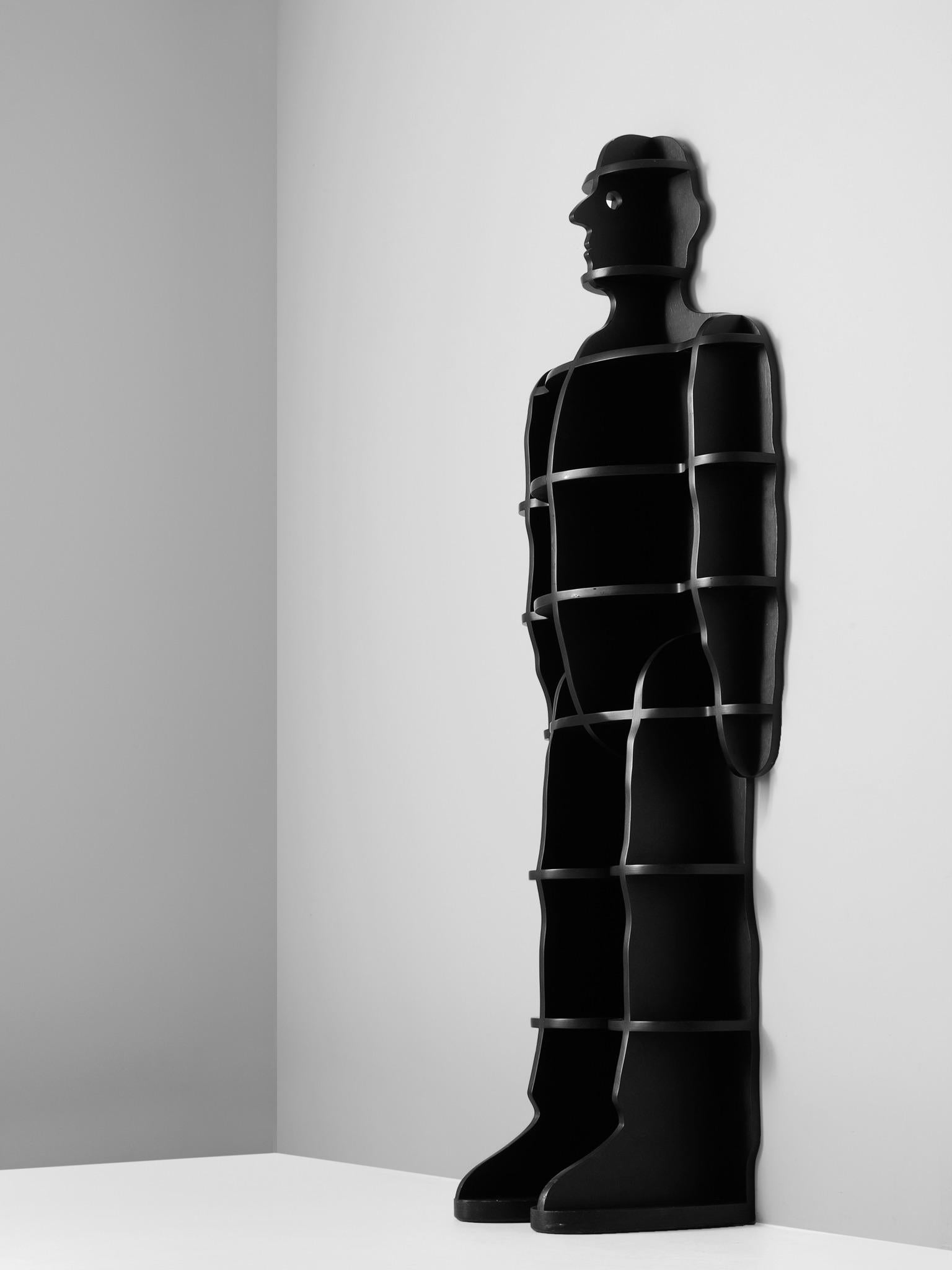 Susi & Ueli Berger for Ro¨thlisberger Kollektion, bookcase, plywood, Switzerland, 1977. 

'Fachermann' in black stained wood, designed by Susi and Ueli Berger in 1977. This giant can guard over your treasures. The upright lines define a human