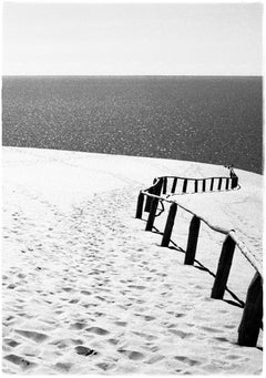 Nida - black and white analogue photograph of sand dunes and sea