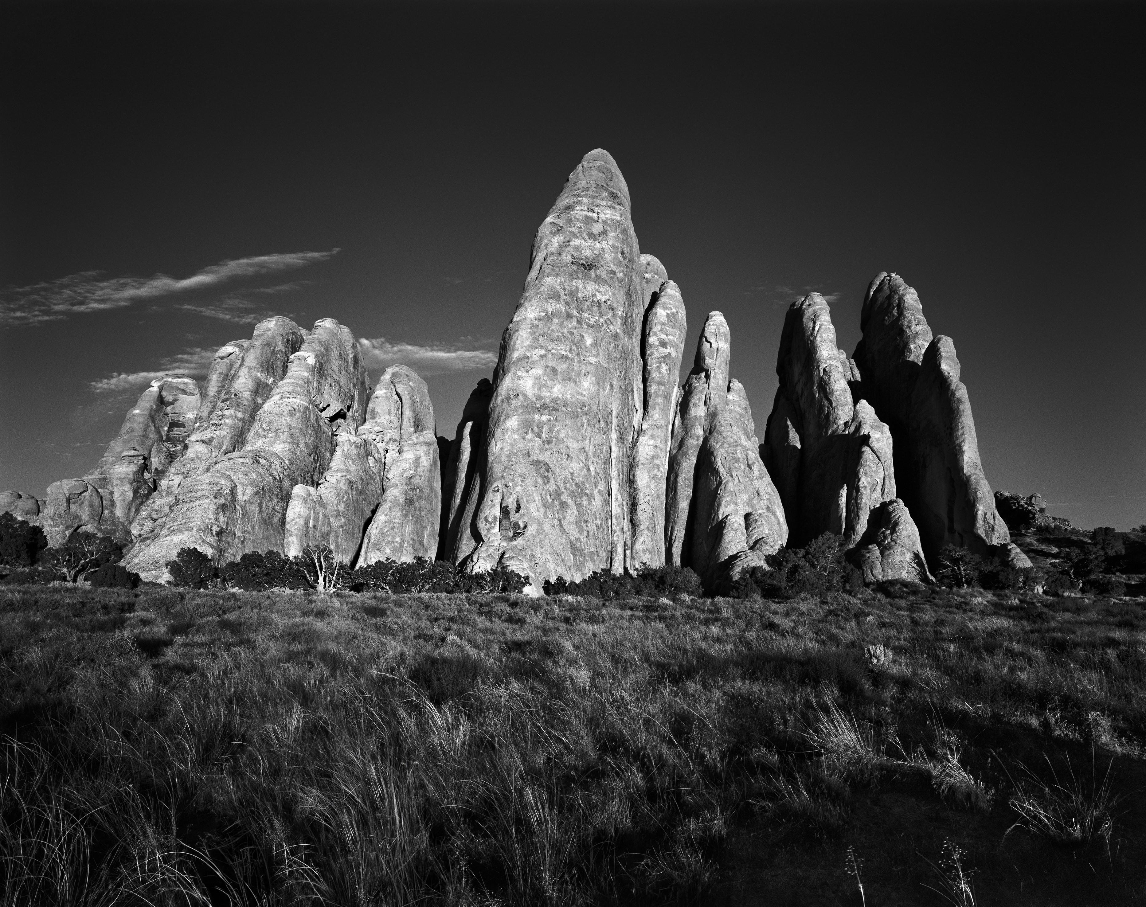 Ugne Pouwell Black and White Photograph - Sand Dune Arches #2- black and white rock arch photography, limitd edition of 20