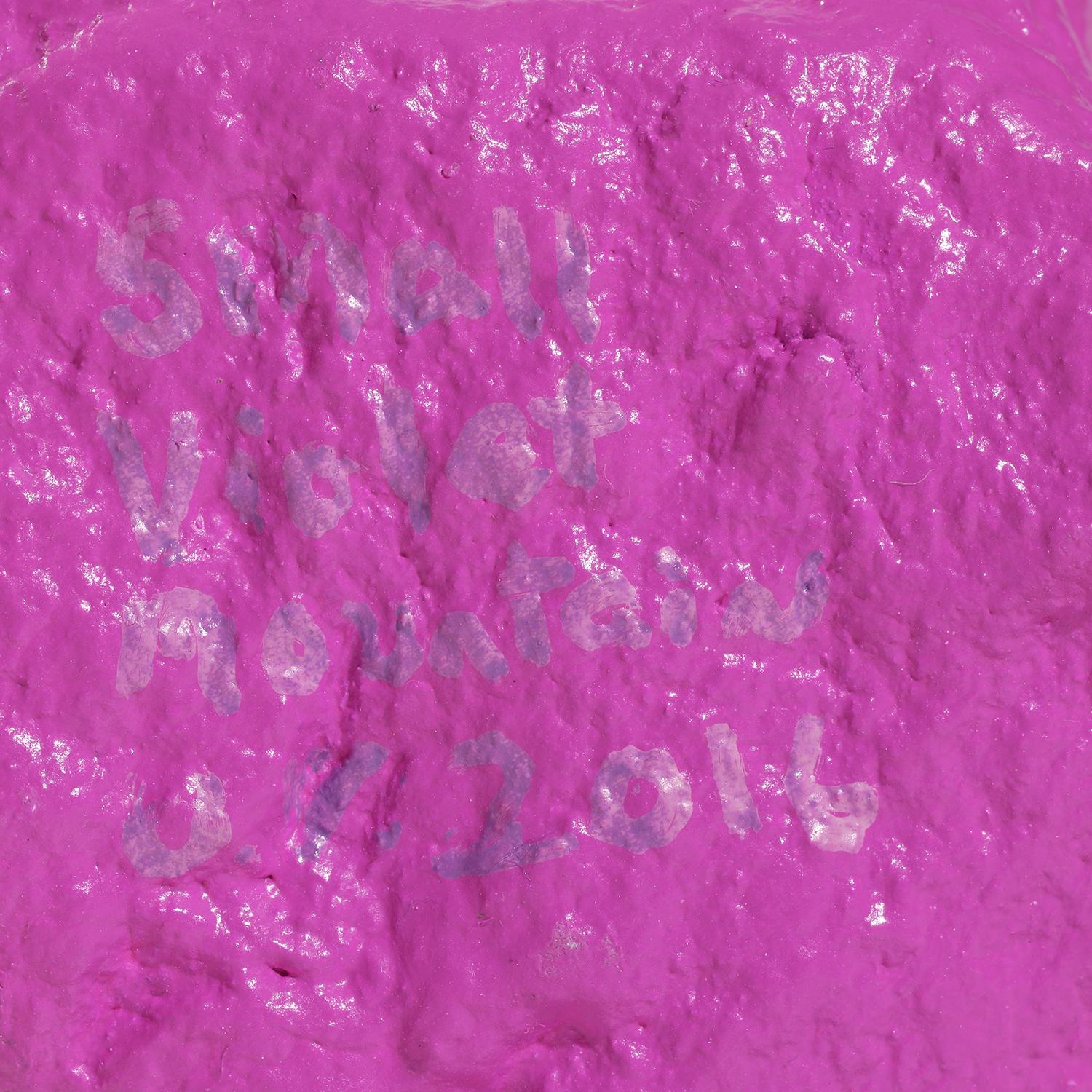 Rondinone’s artistic practice encompasses a range of media, yet he is most celebrated for his land-art-inspired sculptures, notably his renowned Mountains series, of which the current piece is a part. Small Purple Mountain, painted in a captivating