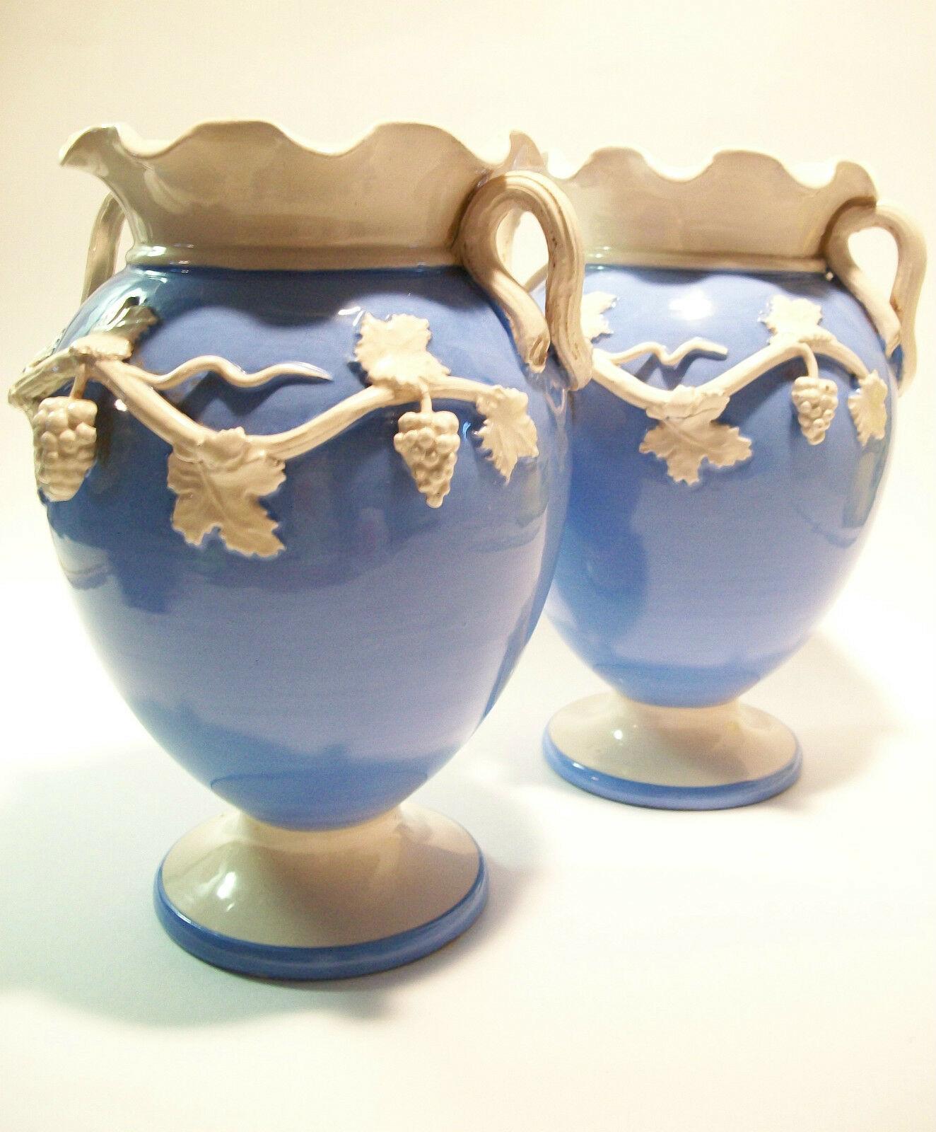 UGO ZACCAGNINI - Vintage exceptional pair of twin handled Italian studio pottery majolica vases - wheel thrown with hand modeled and applied 'grapes' decoration - leaves and vines forming the handles - each vase unique - each signed with a 'Z' and