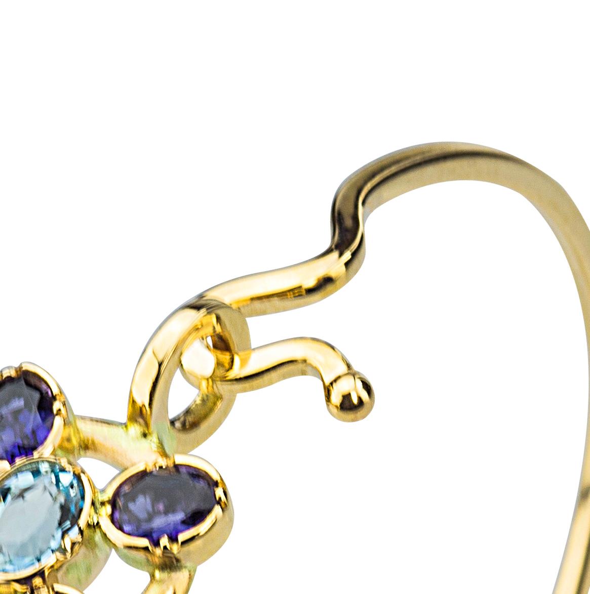  18K Gold Blue Sapphires Aquamarine Twisted Bangle Modern Flower Design Bracelet For Sale 3