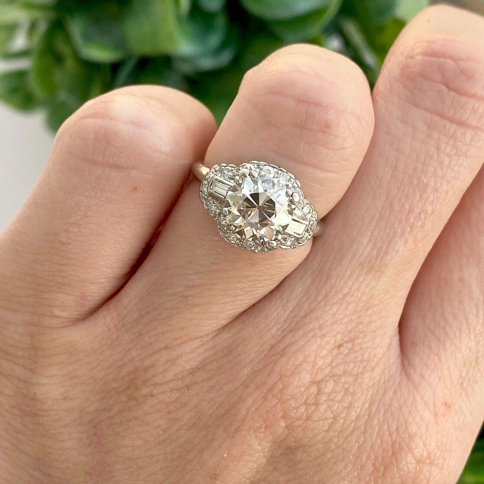 Item specifics
Seller Notes:
“GREAT CONDITION. COMES WITH UGS (EGL USA)CERTIFICATE; CENTER STONE: 2.12CT IJ SI2; SIDE STONES FG VS1-2”
Number of Diamonds:19
Main Stone Creation:Natural
Cut Grade:Excellent
Sizable:Yes
Main Stone