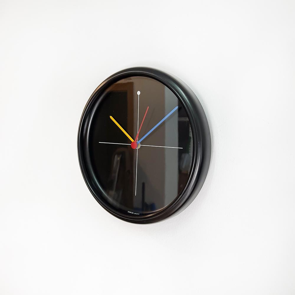 UHR-EL wall clock, 1980's

Black lacquered metal, hands in primary colors.

Working correctly.

Measurements: 26x5 cm.