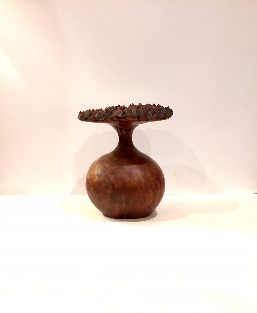 A talented wood artist who selects and uses wood from the west- in particular, Oregon and California to sculpt incredible functional art pieces that maintain elements of the material, exuding grace and pristine craftsmanship. This piece, signed by