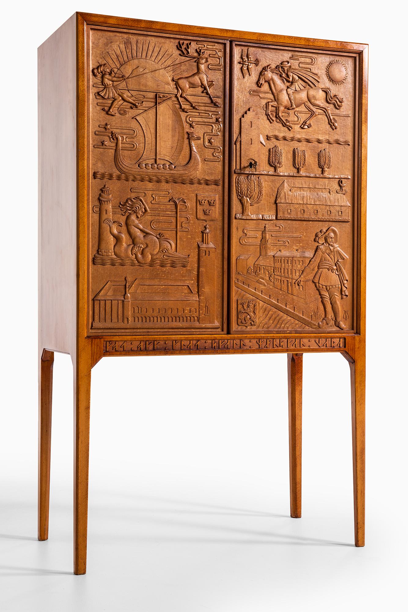 Very rare bar cabinet by Ulla Fogelklou-Skogh. Produced by Bodafors in Sweden. Written with runic in the bottom of the cabinet, which says “Got okk glat skall manskan vara” which translated is “good and happy man shall be”.