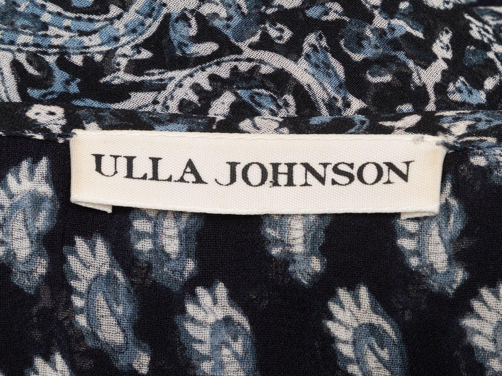 Product Details: Navy and white silk paisley print maxi dress by Ulla Johnson. Crew neck. Long sleeves. Button closures at front bodice. 34