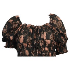 Blusa fruncida estampada de Ulla Johnson, de algodón negro