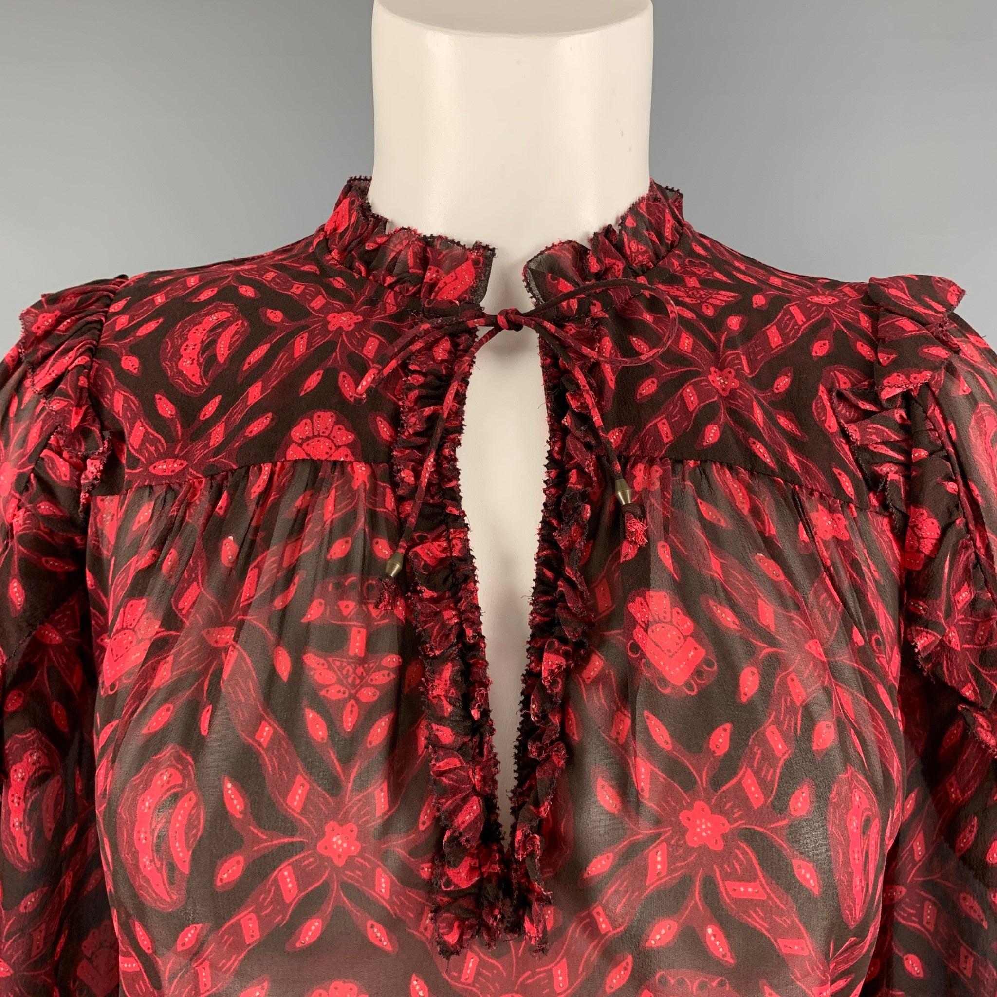 ULLA JOHNSON blouse comes in a red & black silk woven material featuring a oversized fit, long sleeve, V-neck, and ruffle details. Excellent Pre-Owned Condition. 

Marked:   2 

Measurements: 
 
Shoulder: 13 inches Bust: 47 inches Sleeve: 21.5