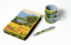 Used "Reading", Landscape embroidery covering book, coffee mug and pen sculpture