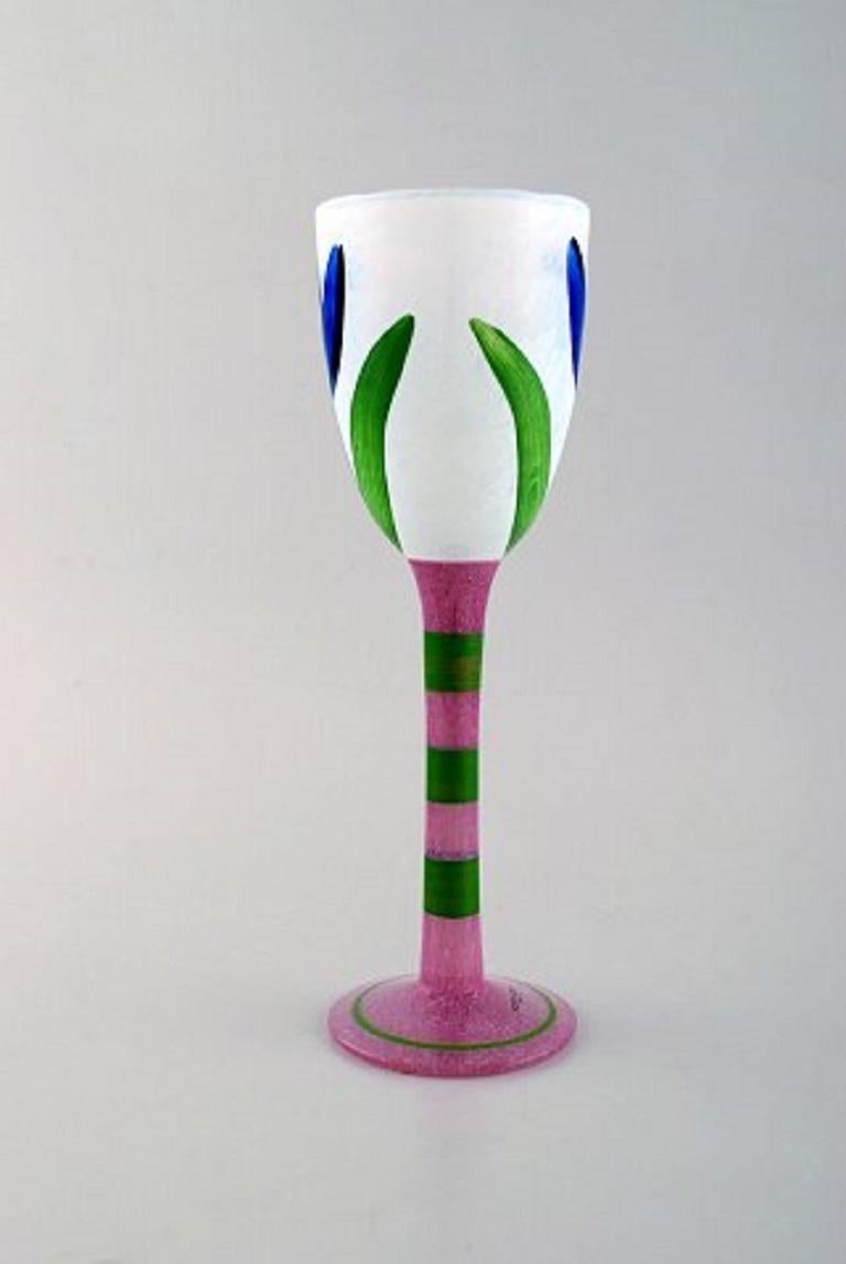 Ulrica Hydman Vallien for Kosta Boda. Hand painted wine glass in mouth blown art glass, 1980s.
Measures: 25 x 8 cm.
In very good condition.
Signed.