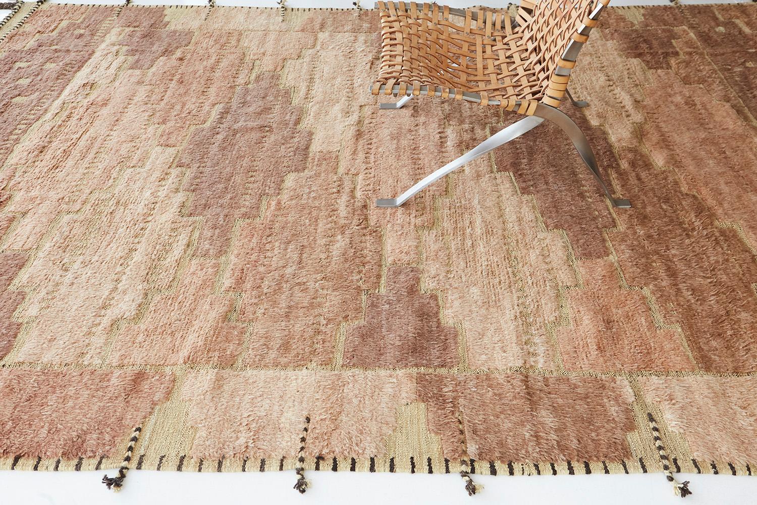 The Ulriken rug is a handwoven wool piece inspired by vintage Scandinavian design elements and recreated for the modern design world. The repetitive slant grid creates balance and harmony, handwoven with a neutral flat weave and unique piles of
