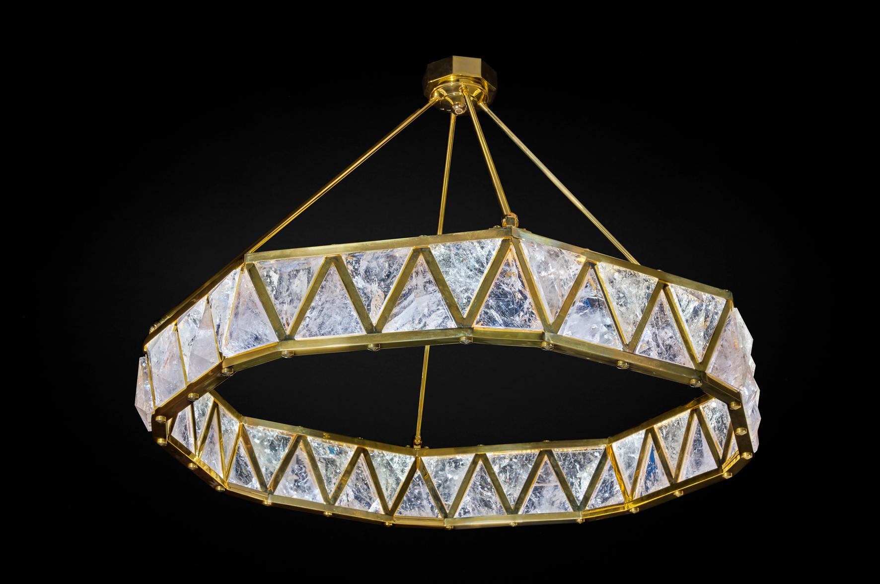 Ultimate Diadem Chandelier.
Is it still a chandelier or a jewel?.
Only made by hand in France by the best art workers .
Brass ,24 K gold plated (same as used by the most prestigious french brands ...),rock crystal stones .
Made only by request