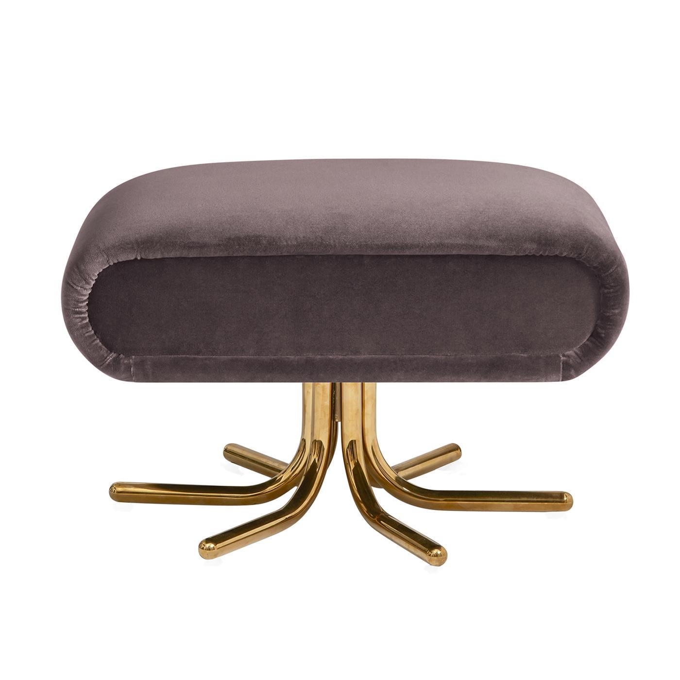 Futuristic glamour. Perched atop polished brass lozenge shaped legs, moody charcoal velvet gives our ultra lounge ottoman a deeply glamorous touch. With a nod to Italian modernism and a hint of Space Age futurism, it's timelessly chic with a smooth