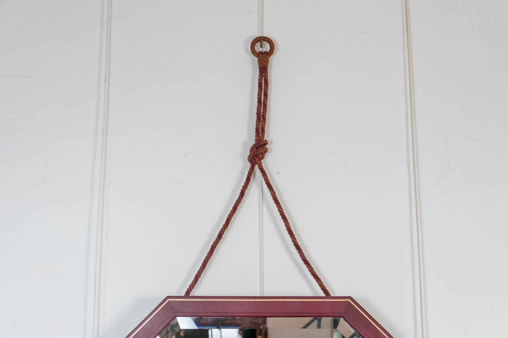 Rare 1930s leather mirror
Dimensions of the mirror without the cord L 106, H 96 cm.