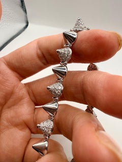 Bracciale con diamanti dal design ultra moderno “CONE” in oro 18 carati