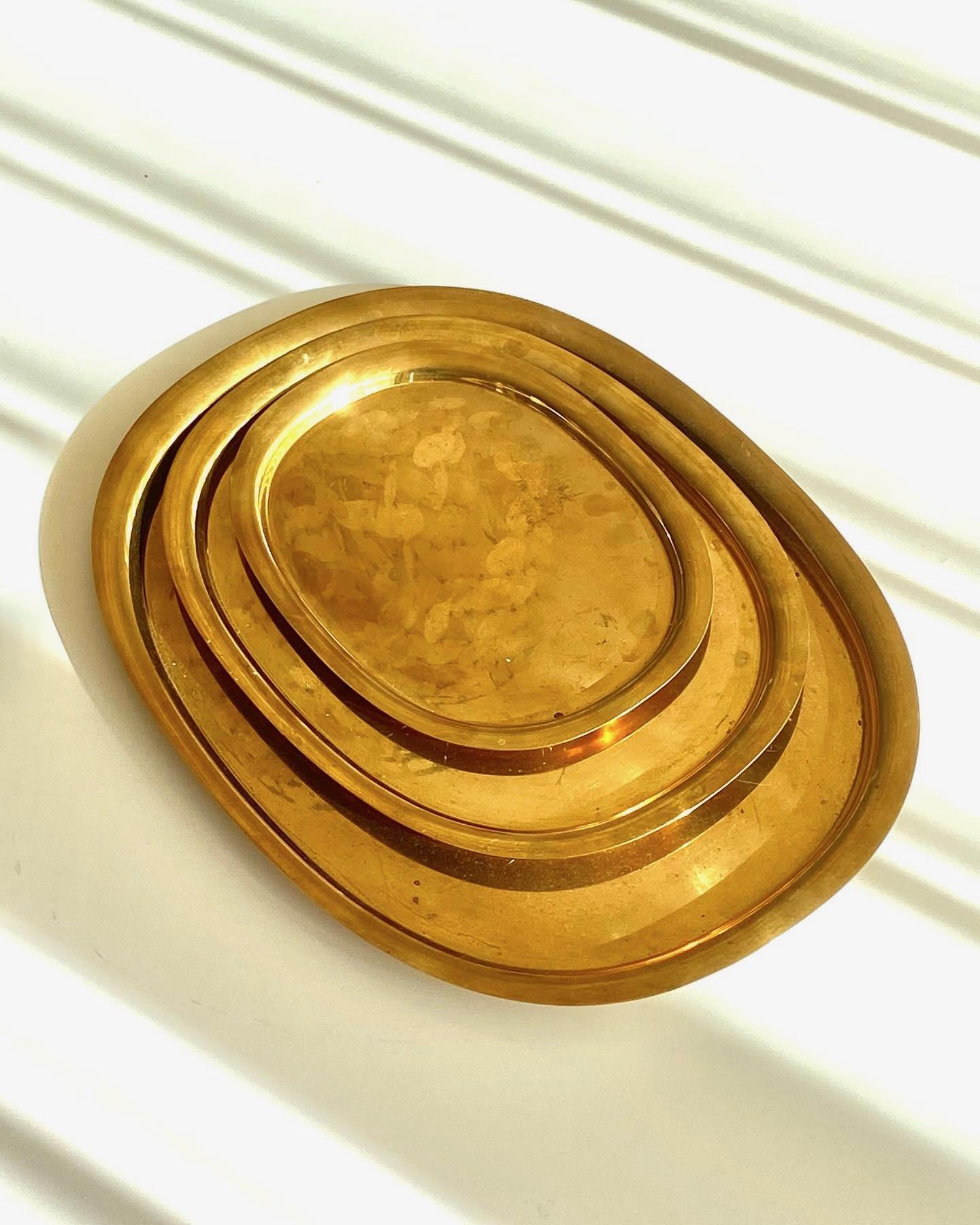Super RAR set of three elliptical solid brass trays. This are the 3 sizes Georg Jensen produced in 1960's. The small one is signed. Very nice set and the large one is difficult to find. Here the chance to get all 3 sizes together. Price for the Set,