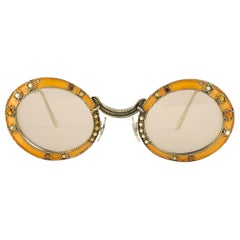 Rarísimas gafas de sol Christian Dior de 1960 con esmalte y joyas de color naranja Archivo Dior