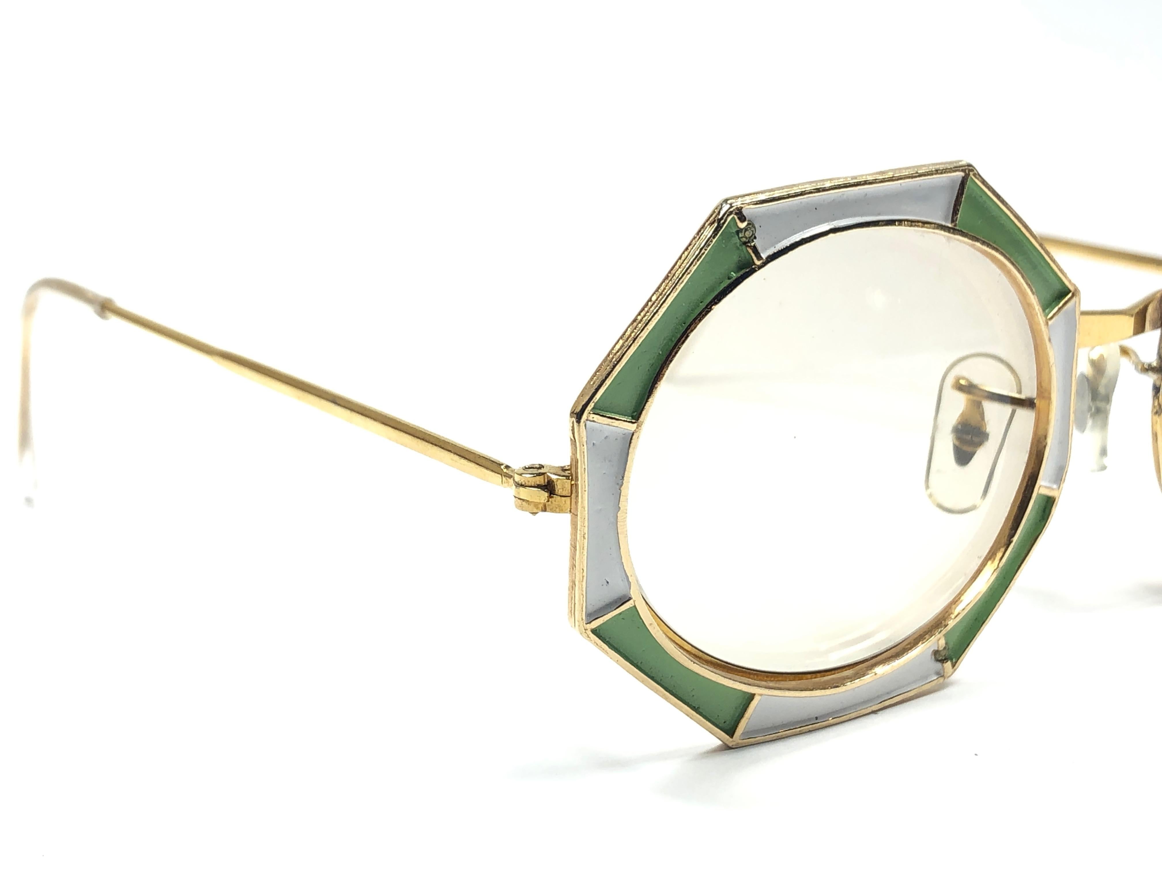 Ultra rare pair of Christian Dior Sunglasses circa 1960's.

This is a seldom and rare piece not only for its aesthetic value but for its importance in the sunglasses and fashion history.   
Delicate enamel on cast iron frame emulating an octagon.