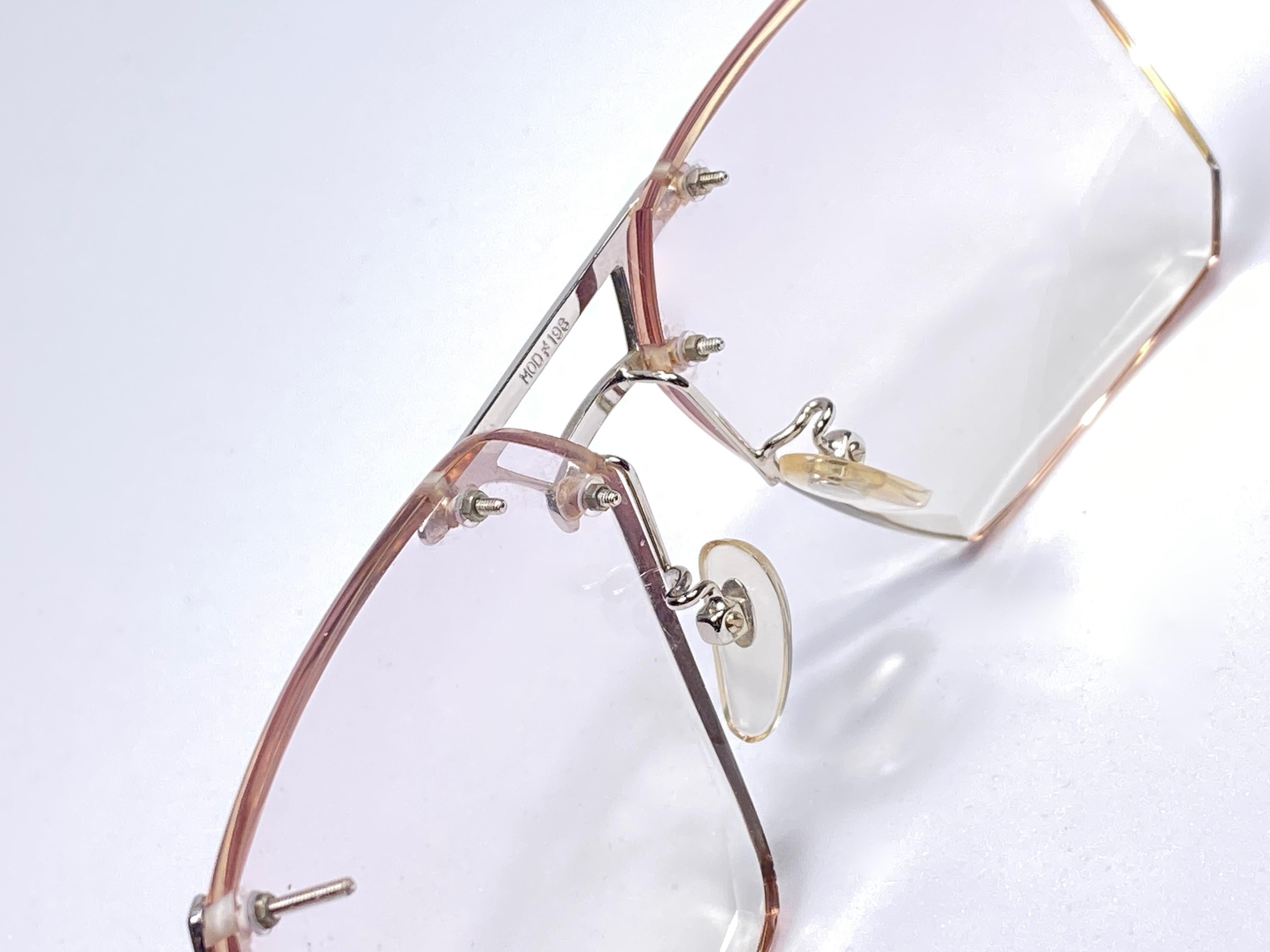 Argent Lunettes de soleil Tura à lunettes translucides sans monture argentées surdimensionnées ultra rares des années 1970 en vente