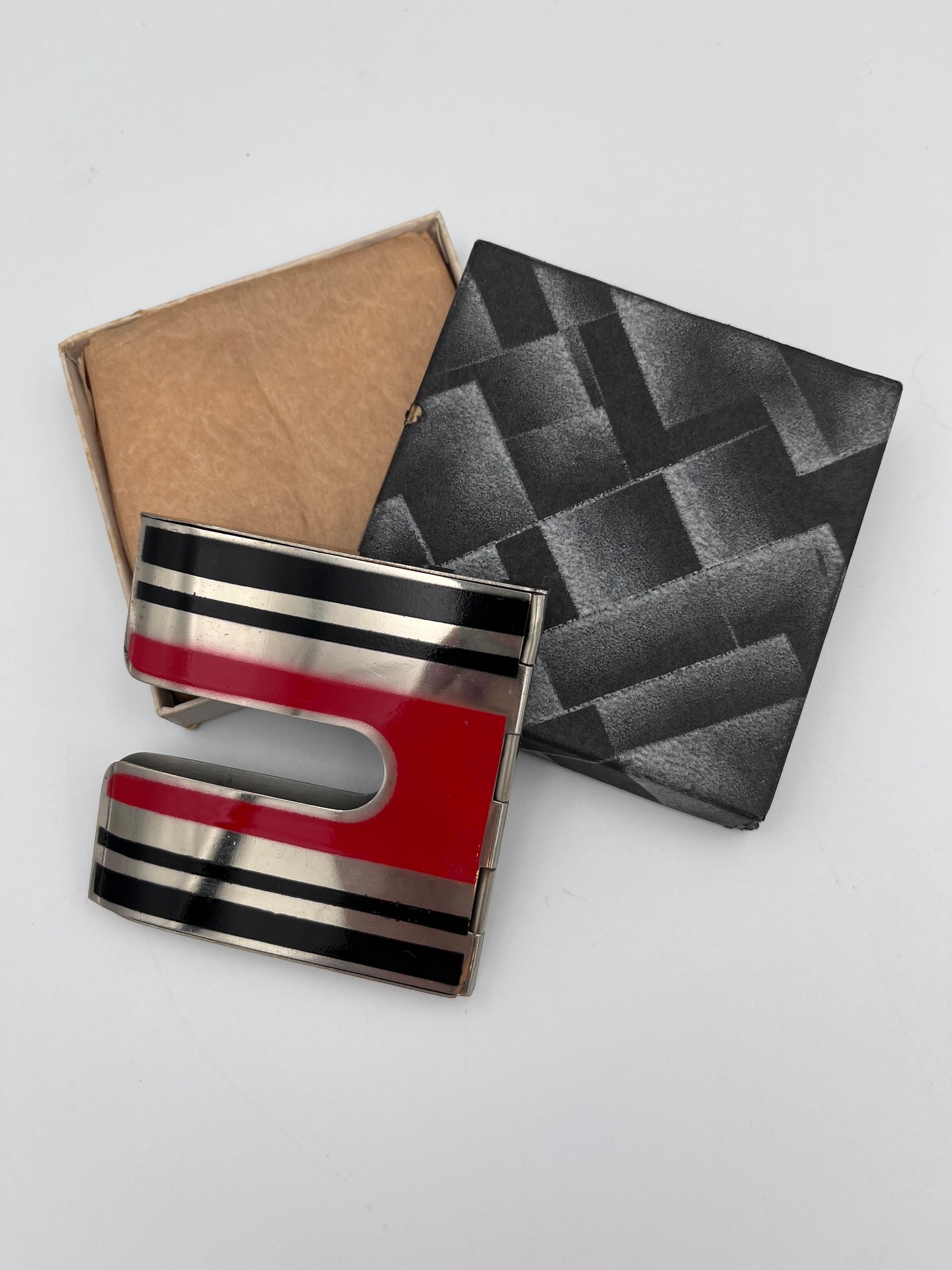 Ultra Rare Art Deco 1930s Slideout Red & Black Cigarette Case with Original Box

A true rarity of Art Deco design, this ingenious 1930s “Slideout” cigarette case combines striking style with an unusually inventive form. Unlike traditional cigarette
