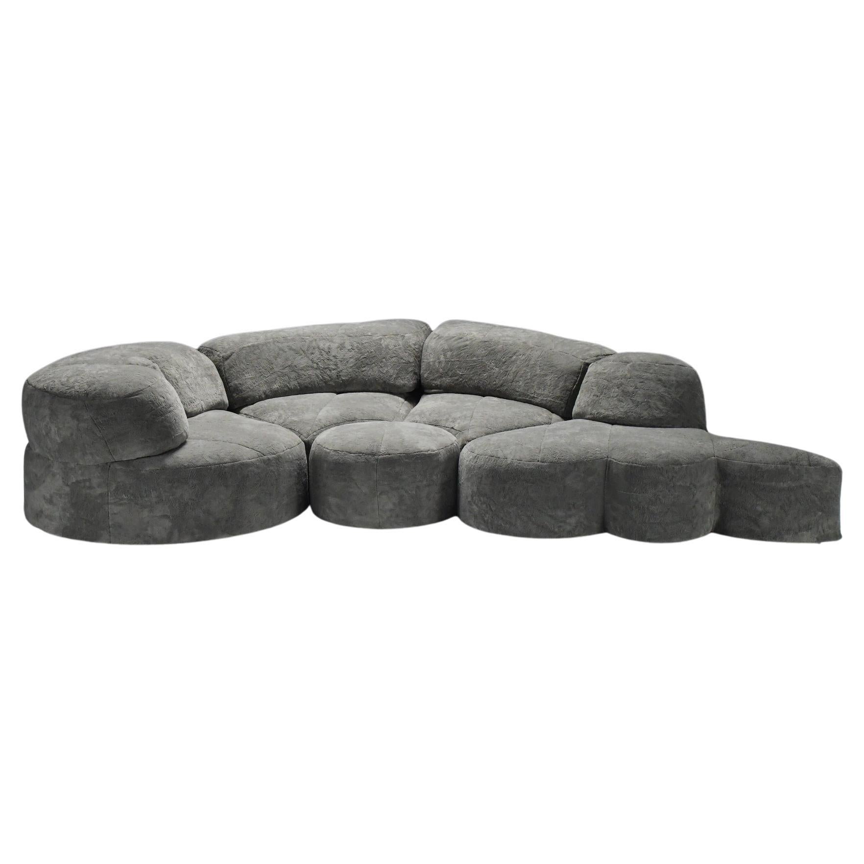 Very stylish & rare ‘Paysage’ modular sofa.  The new  fabric type and color closely resemble those of the original cluddy velvet upholstery.  Additionally, the original sketches and the purchase receipt is available.  The reupholstery was carried
