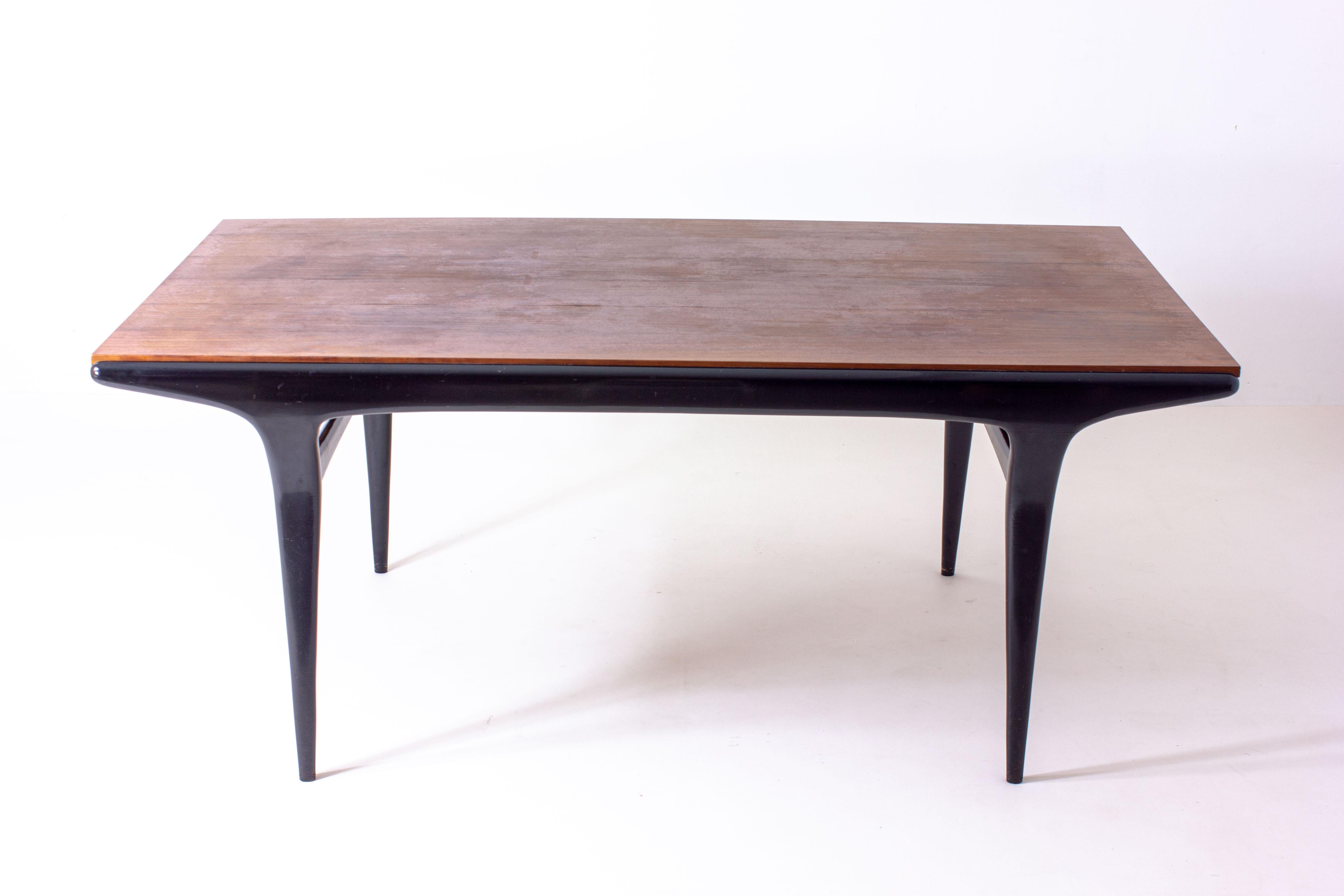 This table is truly one of a kind. Not only is this Alfred Hendrickx’ most high end piece, it also the most sought after. The stark table top contrasts beautifully with the organic and refined table legs. This table is hard to find in any condition,